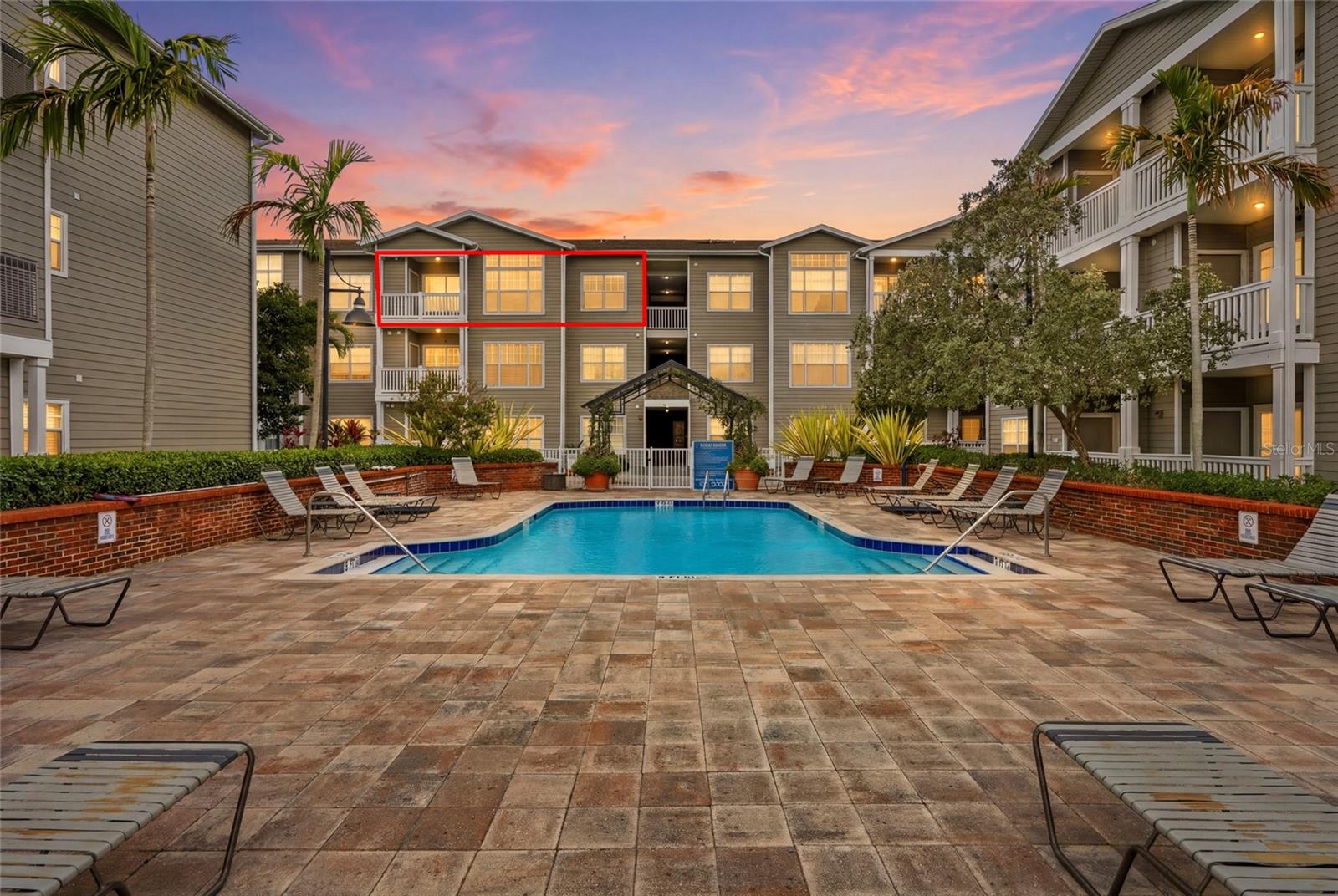 Virtually Staged. Experience the best of Hyde Park living from this TOP-FLOOR condo unit overlooking the resort-style courtyard and pool! Perfectly positioned in the heart of Hyde Park, this beautifully maintained 2-bedroom, 2-bathroom residence offers a thoughtfully designed living space with no neighbors above, creating a peaceful retreat in one of Tampa's most desirable neighborhoods. Step inside and you'll immediately appreciate the soaring ceilings, elegant crown molding throughout, new luxury vinyl plank flooring, freshly painted walls, and windows that flood the home with natural light while showcasing picturesque views of the beautifully landscaped courtyard and sparkling community pool from nearly every room. The kitchen features brand-new stainless steel range and dishwasher, ample cabinetry, and a functional layout. Just off the kitchen, a dedicated laundry closet with washer and dryer hookups provides added convenience while keeping laundry tucked away and out of sight. The generously sized primary suite boasts custom tray ceilings, a spacious walk-in closet, and a private en-suite bath complete with a deep soaking tub and shower. The second bedroom is equally inviting with tray ceilings and a walk-through closet with direct access to the second full bathroom, which also features a deep soaking tub with shower. Step outside to your covered private balcony overlooking the pool and courtyard, the perfect place to enjoy your morning coffee or unwind after exploring everything Hyde Park has to offer! Conveniently situated close to the elevator, everyday living couldn't be easier! One assigned and one unassigned parking space in the secured, gated garage under the building. Residents of Hyde Park Walk enjoy an impressive collection of amenities, including a sparkling pool, fully equipped fitness center, clubhouse, outdoor grilling areas, gazebo, secured pedestrian entry, on-site management, community laundry room, and more! Located in a NON-FLOOD ZONE just steps from an incredible collection of award-winning restaurants, premier shopping, and endless entertainment options, while also offering convenient access to iconic Bayshore Boulevard for waterfront walks, biking, and enjoying some of Tampa’s most scenic views. This is Hyde Park living at its finest - schedule your private showing today!