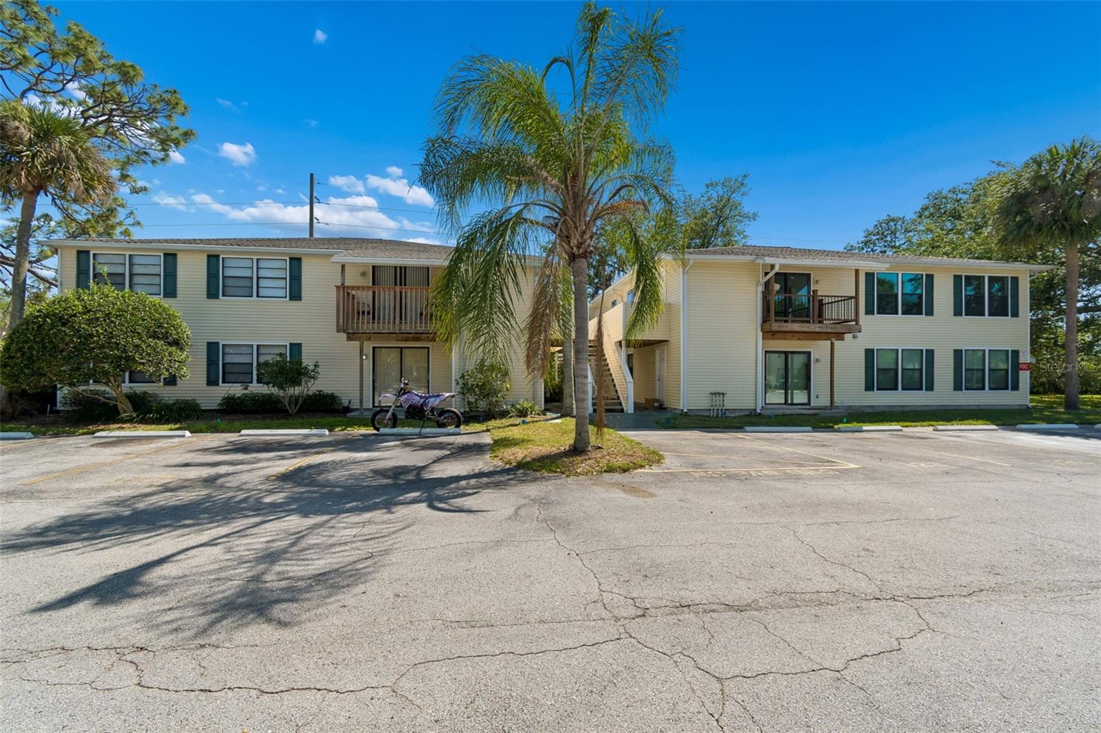 Location, Location, Location!!! Welcome to the carefree living community of Gardens of Forest Lakes in fabulous Oldsmar!  Move-in ready… ALL BRAND NEW in this magnificent home that combines style and functionality.  Be the first to live in this magnificent COMPLETELY REBUILT condo! Just under 1,000 sq. ft. with 2 bedrooms and 2 bathrooms plus a screened balcony. Beautiful luxury vinyl flooring throughout… desirable layout boasts an open concept great room floorplan featuring spacious dining and living areas. Extend your living and entertaining space outdoors through the sliding glass doors leading to the screened balcony with Trek decking and featuring a deep storage closet.  A perfect setting for morning coffee or afternoon cocktails!  Fabulous kitchen offers gorgeous quartz countertop, white shaker soft-close cabinetry with designer hardware, floating shelves, brand-new stainless-steel appliances including refrigerator, ceran top range, built-in microwave, dishwasher and large undermount SS sink.  Hallway laundry room features brand new washer, dryer, water heater and upper cabinetry that is ideal for additional storage.  Convenient hall bathroom boasts decorative single vanity with tub/shower combination with stunning tile waterfall accents.  Primary bedroom is located at the end of the hallway with a spacious walk-in closet and amazing ensuite boasting a designer vanity and gorgeous walk-in shower with tile waterfall accents.  Everything is NEW, including the AC! TOTALLY MOVE-IN READY!!!!  The HOA fee includes exterior maintenance, exterior grounds care, trash as well as fabulous amenities including swimming pool, tennis and racquetball courts, playground and fishing pier. A true Florida lifestyle! Close to shopping, restaurants and medical, easy access to the Pinellas Trail, and of course the famed Gulf beaches are nearby.  A welcoming community and a stylish, move-in ready home await! This is carefree Florida living at its finest!!! Seller financing is available!