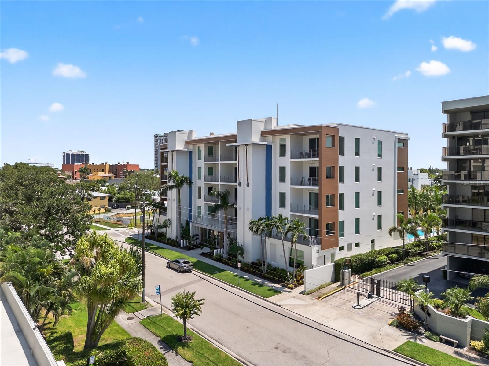 One or more photo(s) has been virtually staged. Positioned in the heart of downtown Sarasota, 711 S Palm Avenue offers a rare blend of privacy, scale, and walkability along one of the city’s most desirable streets. Set just moments from the bayfront, marina, and Sarasota’s top dining and cultural destinations, this residence captures the essence of effortless downtown living. The home is thoughtfully designed with a layout that balances everyday comfort and entertaining, featuring light-filled living spaces, well-proportioned rooms, and a seamless connection between indoor and outdoor areas. Expansive windows invite natural light throughout, while carefully considered design elements create a sense of warmth and livability. The kitchen serves as the central gathering space, designed for both function and hosting, with ample storage, quality appliances, and an easy flow into the main living and dining areas. Private bedroom suites provide comfortable retreats, while the primary suite offers a quiet escape with generous proportions and a well-appointed bath. Outdoor spaces are equally inviting, offering room to relax or entertain while enjoying the energy of downtown just beyond. Whether as a full-time residence or seasonal retreat, the property presents a compelling opportunity to own in a location where everything Sarasota has to offer is just outside your door.