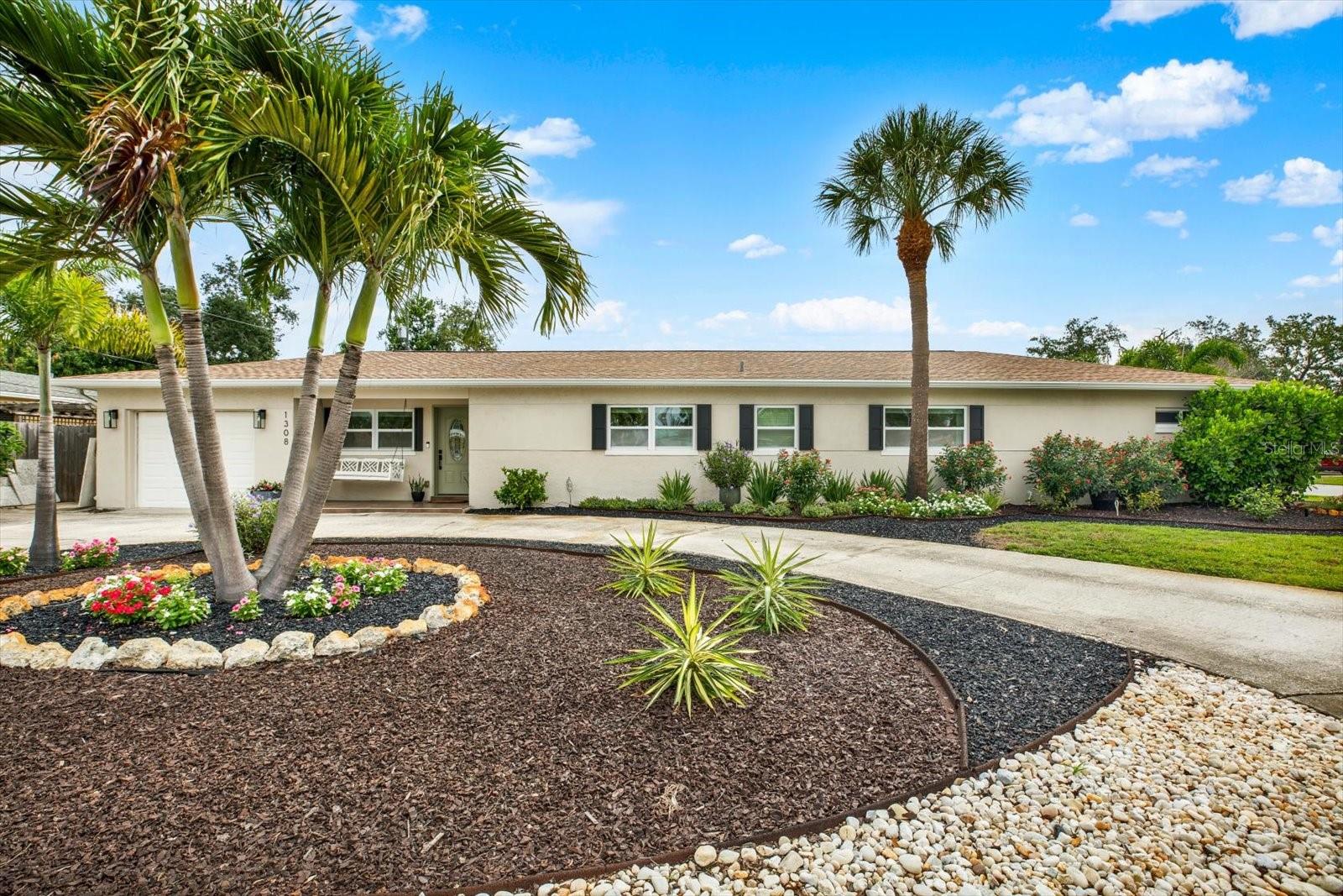 Welcome to 1308 Marion Dr S, a fully transformed, move-in-ready masterpiece nestled on a premium corner lot in the coveted Pasadena Golf Club Estates neighborhood of St. Petersburg, FL. This stunning 3-bedroom, 3-bathroom home has been renovated with uncompromising attention to quality, delivering a level of finish rarely found at this price point in the 33707 zip code. From the moment you arrive, this home sets itself apart. A professionally landscaped corner lot framed by lush new plantings creates instant curb appeal, while hurricane-rated impact windows and an upgraded slider door signal the care and investment made throughout. Inside, an inviting open floor plan welcomes you with wood-look tile and luxury vinyl flooring flowing seamlessly through every room; warm, durable, and effortlessly elegant. The gourmet kitchen is the heart of this home and a true showstopper. Brand-new solid wood cabinetry, thick quartz countertops, premium stainless steel appliances, and designer finishes combine to create a chef's kitchen worthy of any discerning buyer. Whether you're hosting a dinner party or a quiet morning breakfast, this space inspires. The home's thoughtful addition, permitted and completed in 2022, expands the living footprint to approximately 1,900 square feet and adds genuine lifestyle flexibility. The addition includes a full interior laundry room with utility sink and custom storage. This is a home designed to live well. The garage is a true bonus space: spray foam insulated from floor to ceiling and equipped with its own dedicated mini-split HVAC system, it functions year-round as a workshop, gym, hobby room, or flex space that most homes in this neighborhood simply cannot offer. Step outside to your private backyard retreat: a covered patio, low-maintenance artificial turf, designer pavers, and new landscaping create an outdoor living environment worthy of the Florida lifestyle, without the upkeep. A full gutter system and completely overhauled irrigation system with a new pump keep everything looking its best year-round. The mechanical systems match the aesthetic upgrades. Upgraded plumbing supply lines throughout, a secondary water heater in the laundry room, a newer AC unit (one of two systems), dual roofs (main home 2017, addition 2022), and custom window treatments on every window mean this home is not just beautiful, it is built to perform. Location is the final luxury. Pasadena Golf Club Estates sits moments from the #1-rated Gulf Coast beaches, St. Pete Beach and Treasure Island are minutes away. Interstate 275 provides effortless access to downtown St. Petersburg, Tampa, and the entire Tampa Bay region. World-class dining, shopping, and the Pasadena Yacht and Country Club are all within reach. Homes of this quality, fully renovated, storm-hardened, and thoughtfully expanded, rarely come to market in Pasadena Golf Club Estates at this value. Schedule your private tour today and experience the difference between a house and a home. KEY FEATURES: 3 bed | 3 bath | ~1,900 sf | Corner lot | Gourmet quartz kitchen | Hurricane-rated windows & slider | Wood-look tile + LVP flooring | Spray foam garage + mini split | Interior laundry room w/ sink | Secondary water heater | Newer AC (1 of 2) | Upgraded plumbing | New sprinkler pump | Roof 2017 / Addition roof 2022 | Full gutters | Covered patio | Pavers & artificial turf | New landscaping | Window treatments | Minutes to St. Pete Beach | Near I-275, shopping & dining