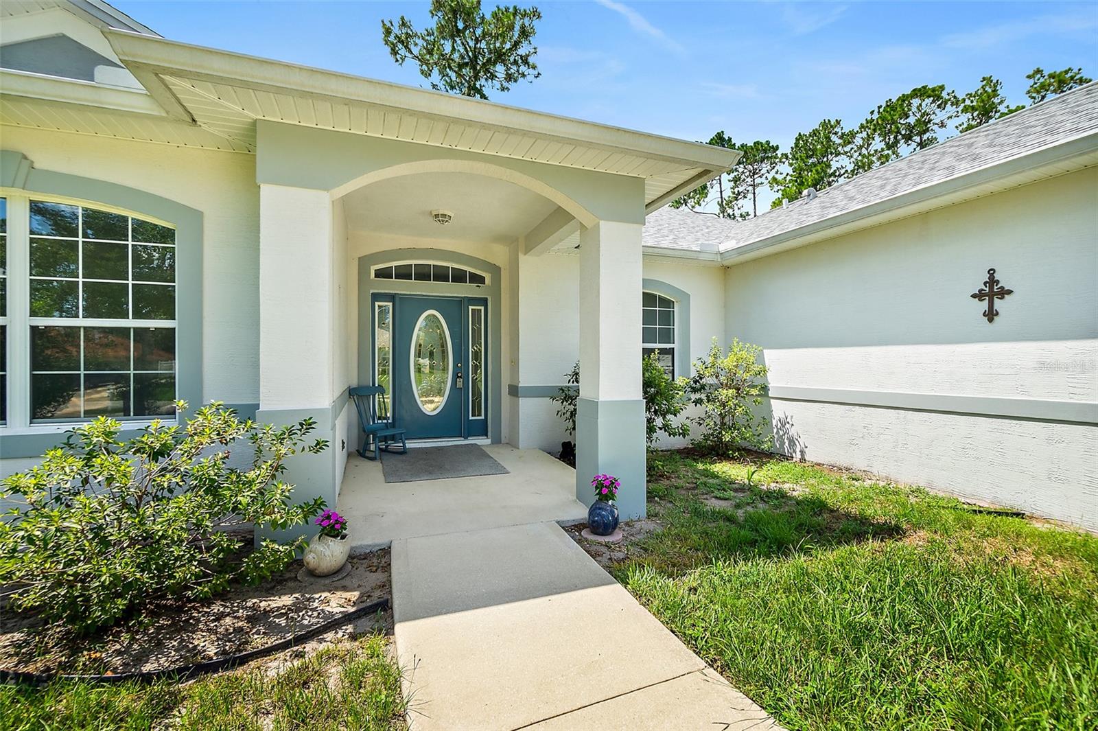 Welcome to this beautifully maintained, one-owner 3-bedroom, 2-bath home plus den in desirable Palm Coast. The spacious kitchen features abundant cabinetry, generous counter space, stainless steel appliances, and a convenient breakfast bar—perfect for everyday living and entertaining.  The primary suite offers direct access to the screened patio, a tray ceiling, cedar-lined closet, additional his-and-her closets, and a spacious en-suite bath with dual vanities. Additional highlights include an oversized garage with attic flooring and pull-down stairs for ample storage. Step outside and relax on the large screened patio overlooking a private backyard with mature shade trees and a charming pond with waterfall. A storage shed is included and conveys with the sale. Enjoy the freedom of no HOA or CDD fees. The interior has been freshly painted in neutral tones, and the exterior has been pressure washed, making this home truly move-in ready.
Conveniently located in the Palm Harbor area, you'll be close to golf courses, waterfront parks, walking and biking trails, shopping, restaurants, hospitals, and just a short drive to the beach. Easy access to I-95 makes commuting a breeze.