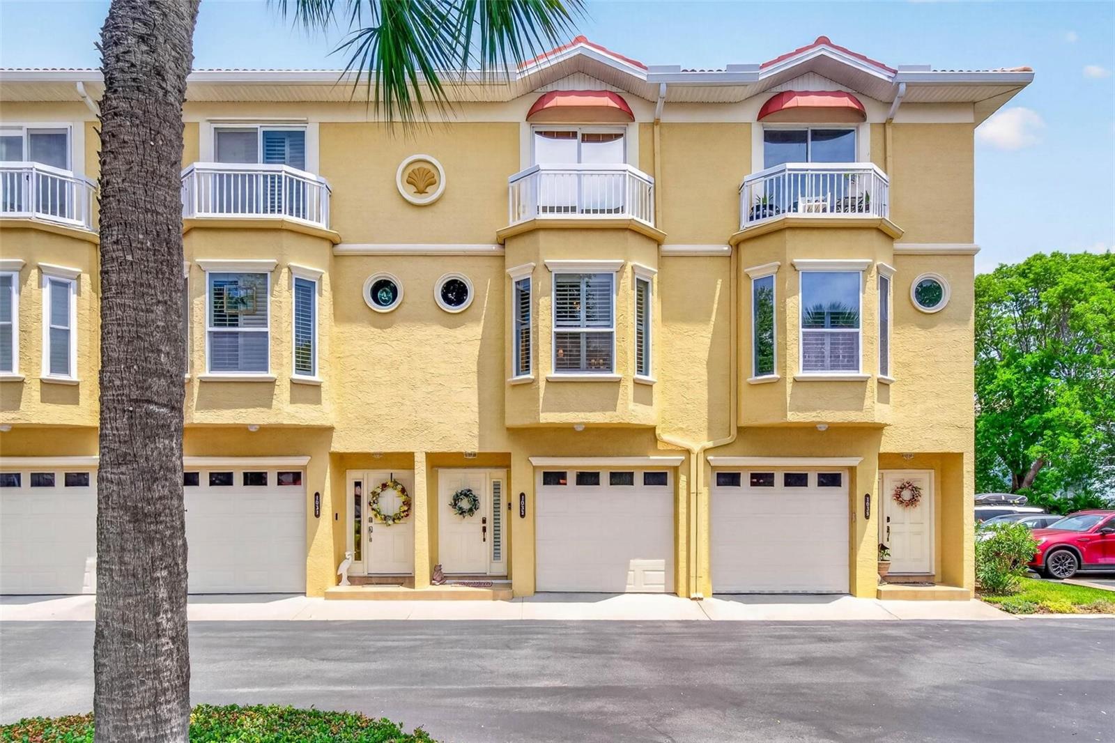 Discover Coastal Paradise! Welcome to this inviting 2,236-square-foot townhouse in the heart of beautiful Tierra Verde, a serene island community at the southern tip of Pinellas County. Built in 2000, this residence offers the perfect blend of comfortable living and effortless access to Florida’s best coastal lifestyle. Step inside to spacious interiors ideal for relaxing or entertaining. The open layout and generous room sizes create a bright, welcoming atmosphere where every day feels like a vacation. Entering into the main living level, you will arrive at your spacious dining room flanked by the inviting living room with wood-burning fireplace and the spectacular kitchen. The kitchen has solid wood cabinets with many pull outs and drawers making excellent use of space. Top it off with the exquisite Taj Mahal quartizite throughout, extra space for a breakfast nook, a middle island, updated stainless appliances, extra-large modern sink, fixtures, hardware and lighting. This level has a half bath making it convenient for enjoying the main living area. Upstairs, you will find your very spacious primary suite with a generous en-suite bath, double sink vanity, soaking tub and separate shower. The primary suite also offers two separate closets with the main closet a large walk-in. Opposite the primary suite is the second bedroom, also with an en-suite bath, great for guests or an office. Separating the primary and secondary suites, is the washer/dryer closet which makes it very handy for laundry time. The third bedroom, also with an en-suite bath and large closet space, is located on the lower level and is great for guests with its access to the patio, community pool and tiki hut. With all the space this townhouse has to offer, your attached garage fits two SUVs tandem and has plenty more storage for all your needs. Feel safe and worry free during storms with hurricane rated windows and shutters. This townhouse’s prime location is just minutes to Fort De Soto Park, home to one of America’s top-rated beaches with miles of pristine white sand, award-winning shores, fishing piers, kayaking trails, historic sites, and scenic views of the Sunshine Skyway Bridge. Perfect for beach days, biking, birdwatching, boating, or sunset strolls. It is also very close to Isla del Sol Golf and Country club where you can enjoy world-class golf, dining, and club amenities nearby. Tierra Verde’s nautical vibe shines through with easy access to marinas, the Intracoastal Waterway, and the Gulf of Mexico. Enjoy island tranquility while being a short drive to St. Pete Beach, downtown St. Petersburg’s vibrant scene, restaurants, and shopping.