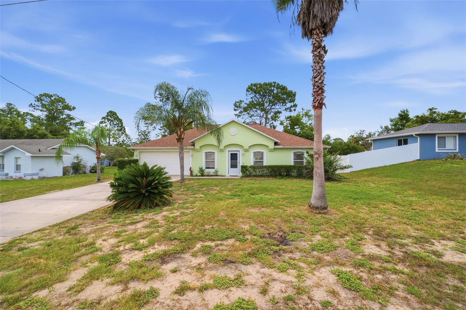 3 Bedroom | 2 Bathroom | 1,620 SF | Fully Fenced - 

NEW ROOF IN 2023!

This 3 bedroom, 2 bathroom home has high ceilings that create an open and spacious feel as soon as you walk through the door. Offering 1,620 square feet of living space, a split bedroom layout, two living areas, and two dining spaces, there's plenty of room to spread out while still keeping everyone connected. Move in ready and well maintained, this home has a lot to offer both inside and out.

The home features updated vinyl flooring, plenty of cabinet space in the kitchen, and a primary bedroom with its own private bathroom.

Outside, the HUGE backyard is fully fenced with beautiful white vinyl fencing and sits on nearly a quarter of an acre, offering plenty of room to enjoy. The shed stays with the property for additional storage, and the 2 car garage provides plenty of space for vehicles and everyday storage needs.

Conveniently located near shopping, restaurants, entertainment, and everyday amenities, this home offers the added benefit of no HOA and no CDD fees.

The combination of space, updates, and location makes this one easy to appreciate.