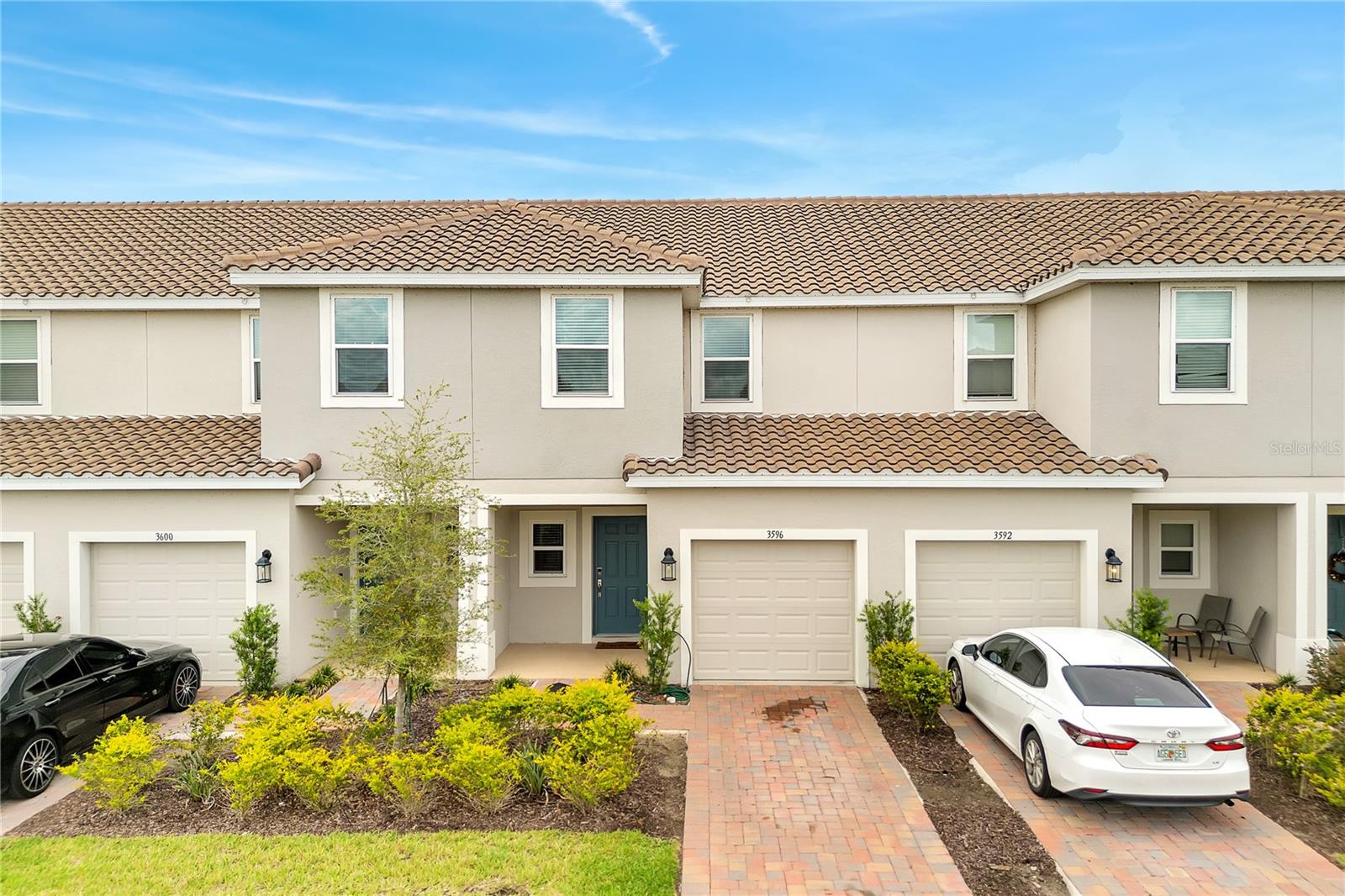 Barely 3 years old, this beautifully maintained Bellalago townhome, built in December 2023, sits on a premium pond view lot and features a durable concrete tile roof. The open concept floor plan offers a spacious great room that flows seamlessly into the modern kitchen, complete with a large center island. The first floor also includes a convenient half bathroom, a one car garage, and a private fenced patio overlooking the peaceful pond. Upstairs, you'll find a spacious primary suite, two additional bedrooms, a full bathroom, and an upstairs laundry area for added convenience. Ample storage includes a pantry, linen closet, under stair storage, and generous bedroom closets. As a resident of Bellalago, you'll enjoy access to exceptional resort style amenities, including a community pool, fitness center, tennis and basketball courts, playgrounds, and a private boat ramp with direct access to Lake Tohopekaliga. The home is also zoned for Bellalago Academy Charter School (K through 8) and is conveniently located near shopping, dining, schools, and major roadways. Don't miss this opportunity to lease a modern home in one of Kissimmee's most sought after gated communities. Schedule your private showing today!