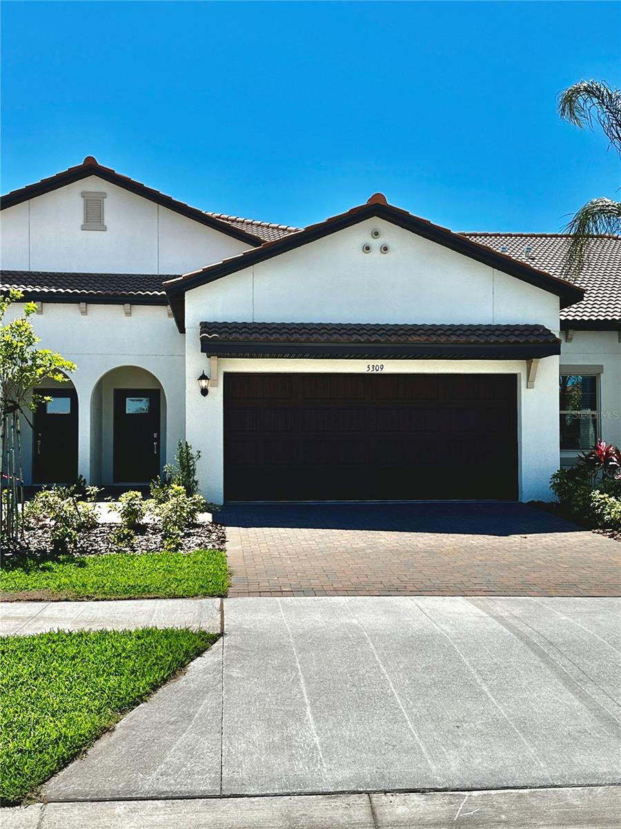 Enjoy your best life in this premier 55+ active adult community - The Medley @ Southshore Bay. This beautiful 2 story villa has so much to offer! Open concept floor plan features: designer kitchen w/quartz countertops & stainless appliances ~ neutral gray tone ceramic flooring ~ primary bedroom suite downstairs ~ two car garage ~ versatile loft space/bonus room upstairs w/ private guest bedroom + full bathroom ~ gated community ~ golf carts are permitted ~ high speed internet & cable are included! Residents can enjoy The Medley clubhouse with indoor/outdoor dining, tiki bar, planned community events, fitness center, resort style heated swimming pool, tennis courts, pickleball, volleyball, and bocce ball courts, billiards, along with an onsite activities director. OR...you and the family can visit the community Lagoon where resort-style amenities are part of everyday life. It’s the very best of beachfront living, but inland! –5 acres of crystal-clear blue waters, surrounded by sand, a swim-up bar, a full calendar of resident-only events, and sunset views. The HOA covers exterior (including roof) maintenance, landscaping, gated security, cable TV and high-speed internet, community pool, fitness center, pickle ball, bocce ball, a café and more!  *All information contained herein subject to change without notice to include any fees associated with property. Buyer to satisfy themselves of any/all room measurements. All information TBV by Buyers.*