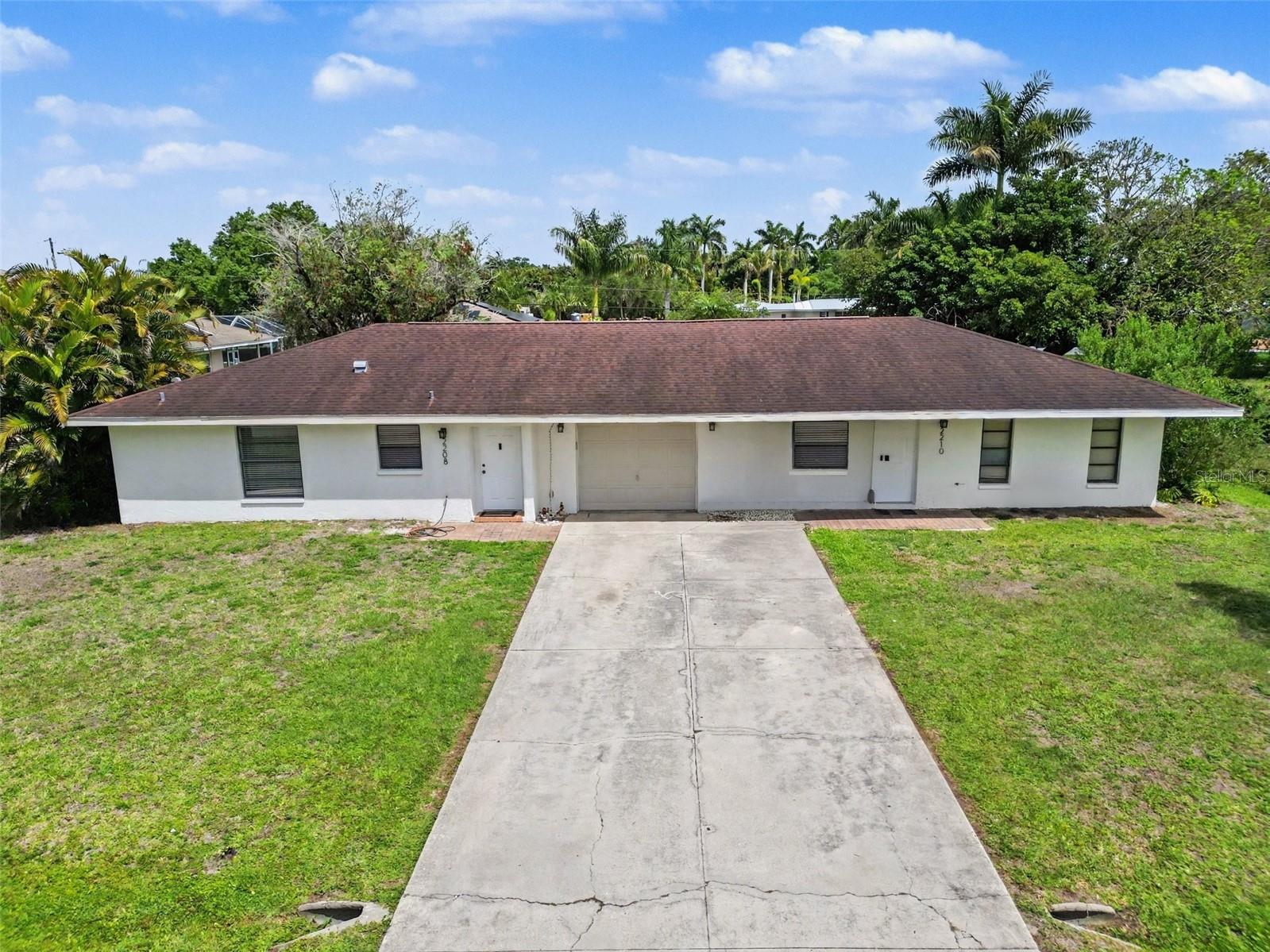 Stop scrolling—your “set it and forget it” investment just hit the market. This beautifully remodeled duplex offers the perfect blend of style, location, and immediate income potential. Ideally situated with quick access to Downtown Fort Myers—enjoy Music Walk, Art Walk, dining, and entertainment—plus convenient access to I-75. Inside, both units have been thoughtfully updated with modern finishes including granite countertops, stainless steel appliances, shaker-style cabinetry, and stylish backsplashes. But this property isn’t just attractive—it’s a true income-producing asset. Income-Ready Investment – Tenants Already in Place! Why work hard for your money when this house is already doing the heavy lifting and the tenant-finding for you? *** Unit 4408 • 2 Bedrooms / 1 Bathroom • Tenant in place through March 31, 2027 at $1,300/month • Fully updated kitchen & bathroom • New tile flooring throughout • Screened lanai with washer & dryer in laundry closet • Spacious backyard with use of storage shed *** Unit 4410 • 2 Bedrooms / 2 Bathrooms / 1-Car Garage • Sliders to back patio • Currently rented at $1,500/month (month-to-month) • Tenant would like to stay—or you have the flexibility to occupy. Located in a quiet, family-friendly neighborhood close to shopping, dining, and everyday conveniences. NO HOA - Immediate cash flow - Owner-occupant flexibility! Whether you’re looking to expand your portfolio or live in one unit while the other helps pay the mortgage, this is a true plug-and-play opportunity. Don’t miss your chance to own a turnkey, income-producing property in a prime Fort Myers location—schedule your showing today before it’s gone!