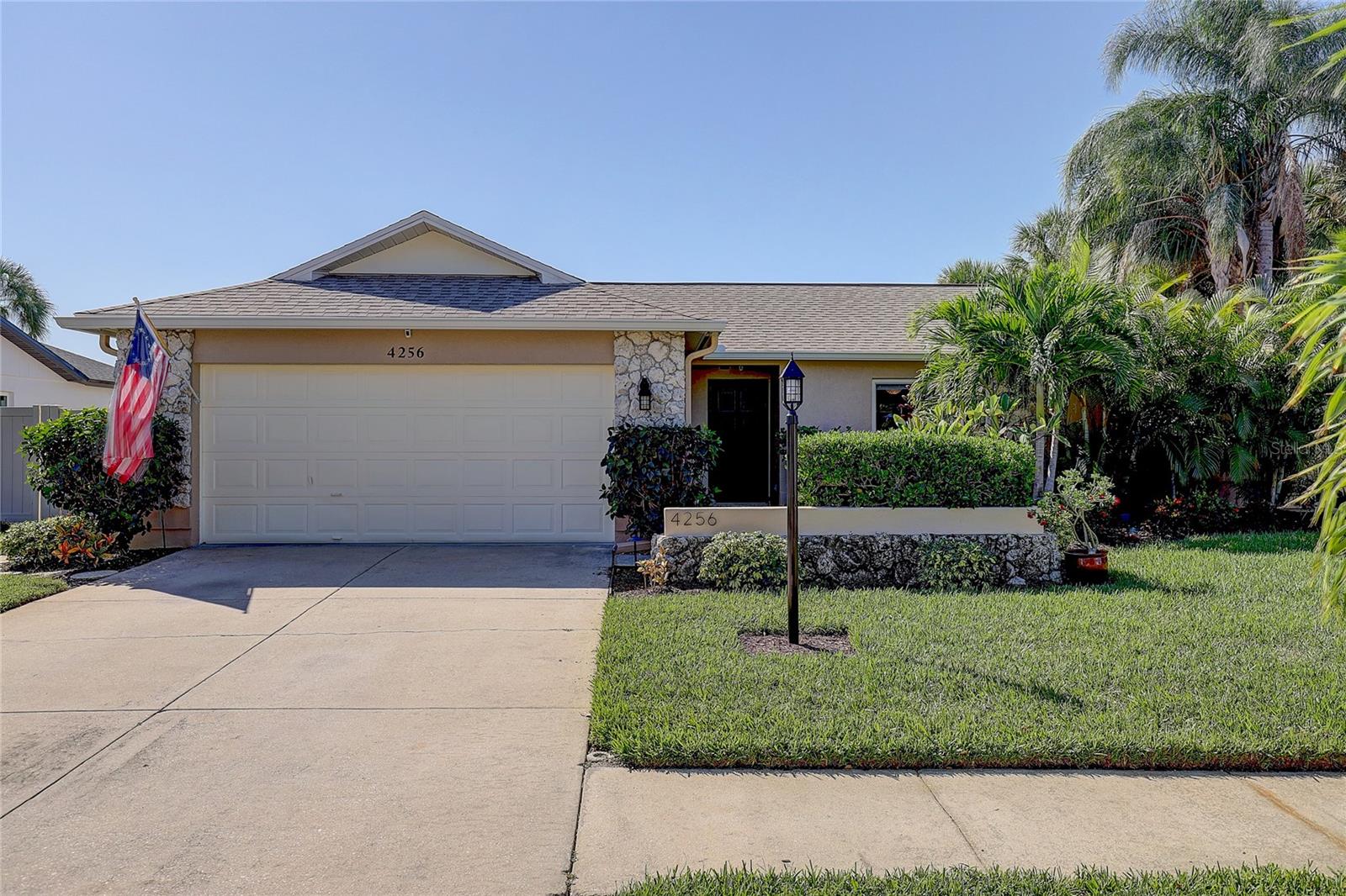 Just reduced $10,000. This recently updated 3-bedroom, 2-bathroom, 2-car garage home in Gulf Gate East is move-in ready and full of impressive features. This property won’t last long. Notable improvements include a new roof installed and all new aluminum gutters in 2021, a saltwater heated pool with a pool cage added in 2020 with a 200 amp electrical panel, updated bathrooms, and impact windows from the same year. The property also offers a vinyl fence enclosing the entire backyard, a mini split system with A/C and Heat was added to the Florida Room in 2020, and beautifully landscaped tropical surroundings complete with an updated inground irrigation system. Gulf Gate East is a highly sought-after and welcoming neighborhood known for its wide streets, sidewalks, numerous ponds, and frequent wildlife sightings. Residents often enjoy leisurely walks with their dogs and family strolls in the evening. Conveniently located, Gulf Gate Village, with its array of highly-rated restaurants and shops, is just minutes away by bicycle or vehicle. Additionally, the beautiful Siesta Key Beach is a mere 10-minute drive, providing an opportunity to live in a vacation-like setting every day. Come live on Vacation.