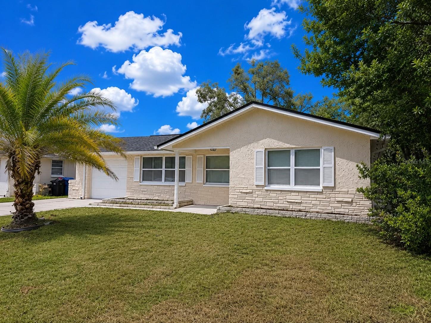 Stop searching—your next home is here. Welcome to this beautifully upgraded home in the heart of New Port Richey, where modern finishes meet everyday comfort. From the moment you walk in, you’ll appreciate the wood-look tile flooring throughout, creating a seamless, stylish look that’s as durable as it is beautiful.

Step outside to a fully fenced backyard, offering the perfect space for entertaining, relaxing, or enjoying your own private retreat. Best of all, there’s no HOA, giving you the freedom and flexibility you’ve been looking for.

Loaded with upgrades, this home delivers the fresh, move-in-ready feel of new construction without the wait. Ideally located near shopping, dining, parks, schools, and major roadways, you’ll enjoy convenience just minutes from everything.

Homes offering this combination of upgrades, privacy, and no HOA are hard to find and don’t stay on the market for long. Schedule your private tour today before someone else calls it home! $150 admin fee due at move in.