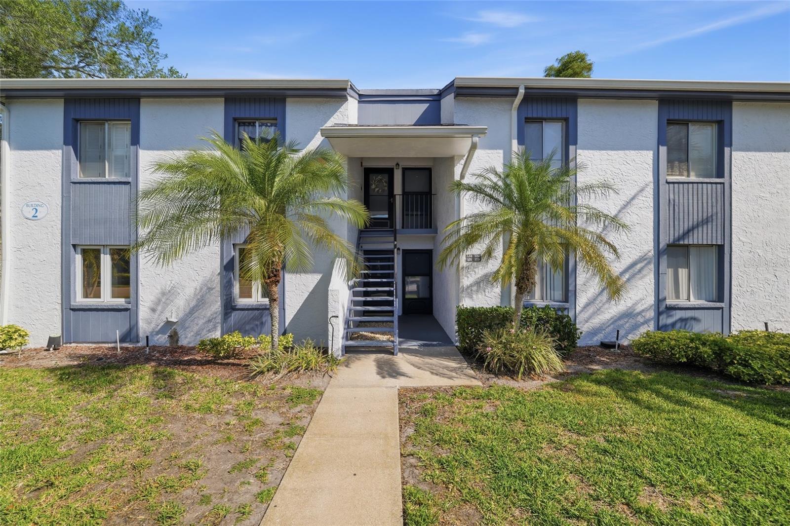 One or more photo(s) has been virtually staged. Welcome to this two-bedroom, two-bath condominium in Oldsmar, offering 1,054 square feet and a flexible opportunity for investors, first-time buyers or seasonal residents. This residence is vacant and ready for immediate occupancy or renovation. The interior reflects the original condition, presenting a value-add opportunity for customization. The primary bedroom includes a walk-in closet, and the layout supports functional living and dining spaces. Recent updates include an air-conditioning system installed in 2025, along with a washer, dryer and refrigerator replaced in 2024. This property is well-suited for buyers seeking to personalize a residence or secure an investment with long-term potential. Conveniently near shopping, dining and commuter routes, supporting full-time and seasonal living.