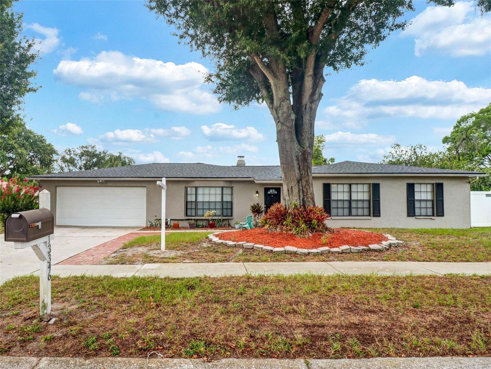 Virtually Staged. Beautifully remodeled home in the desirable Lake Magdalene Arms Estates community! This stunning three-bedroom, two-bathroom home with a two-car garage has been tastefully updated throughout and is move-in ready.
Enjoy outdoor living in the spacious, fully fenced backyard featuring a large, screened lanai—perfect for weekend family gatherings, relaxing evenings, and year-round entertaining.
Inside, you'll find a beautifully updated kitchen complete with quartz countertops, stainless steel appliances, a stylish glass tile backsplash, and ample cabinet space. The inviting family room features a cozy fireplace, creating the perfect place to unwind. Both bathrooms have been tastefully renovated with quartz countertops. Luxury waterproof vinyl flooring flows throughout the entire home.
Situated in the highly sought-after Lake Magdalene area, this home offers exceptional convenience with easy access to I-275, Veterans Expressway, the University of South Florida, Carrollwood, premier shopping, dining, and entertainment.
The oversized 85' x 125' lot provides plenty of privacy and room to enjoy the outdoors. Additional highlights include an inside laundry room with the washer and dryer included, a newer water heater, and an updated HVAC system.
This exceptional home truly has it all—modern updates, an ideal location, and wonderful indoor and outdoor living spaces. Check out the VIRTUAL TOUR in the link above.