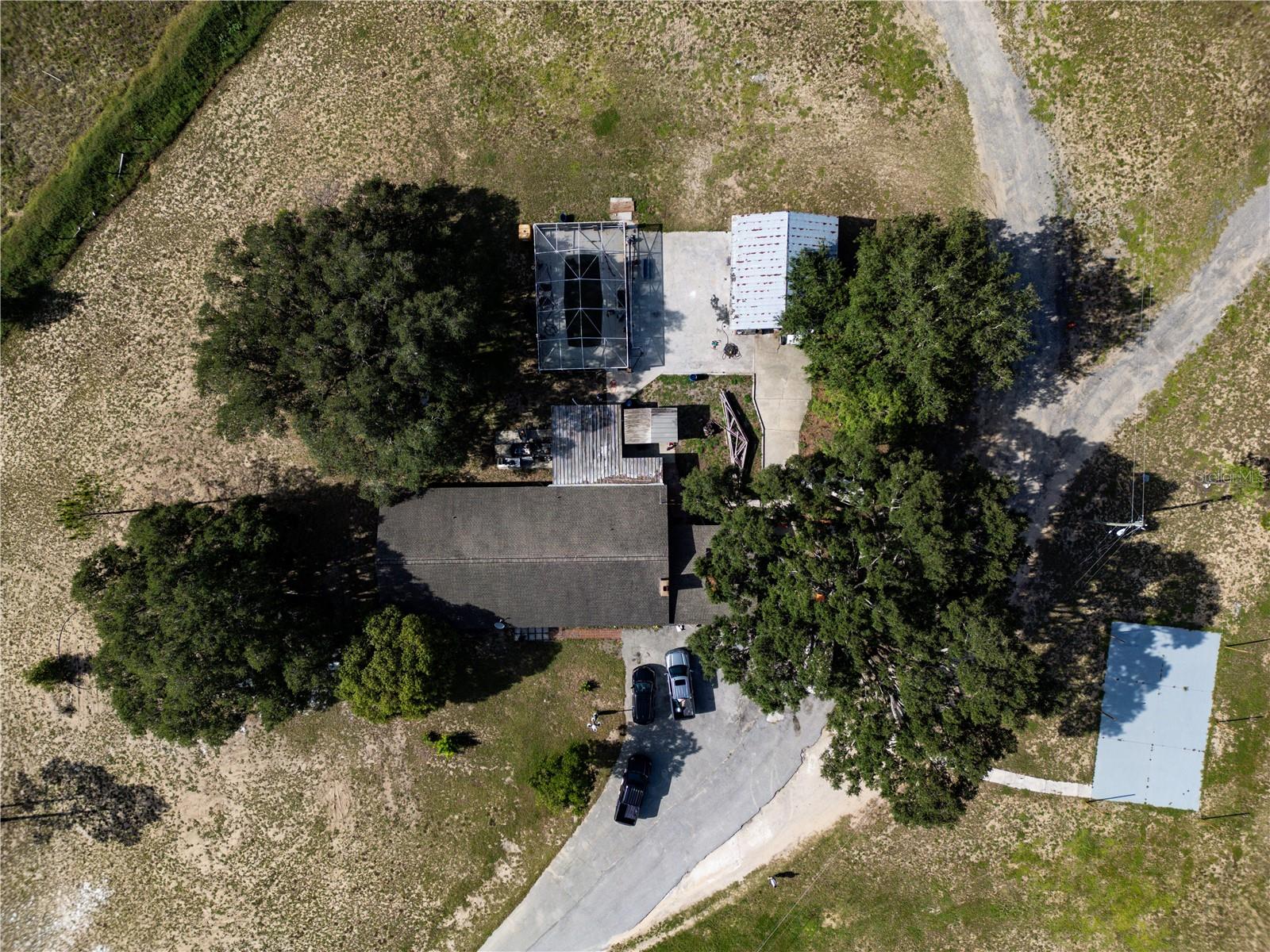Exceptional opportunity for developers, investors, and land bankers to acquire approximately 159 acres in the rapidly growing Haines City market. Approximately 99 acres are buildable, while the remaining acreage borders a protected nature preserve creating a unique balance of development potential and natural beauty. The property includes two existing 3-bedroom homes, providing immediate income potential, on-site offices, or housing during the planning and development process. Additional improvements include a horse stable and a large barn, offering flexibility for agricultural, equestrian, or interim uses. Ideally positioned in one of Central Florida's fastest-growing areas, this property presents outstanding potential for a residential community, estate lots, or other development opportunities, subject to zoning and governmental approvals. The preserved acreage offers the opportunity to create a thoughtfully planned community with premium natural amenities. Large tracts with this combination of buildable land, existing improvements, protected natural surroundings, and prime Haines City location are increasingly rare. Buyer to verify acreage, zoning, land use, environmental regulations, and all development potential through their own due diligence.