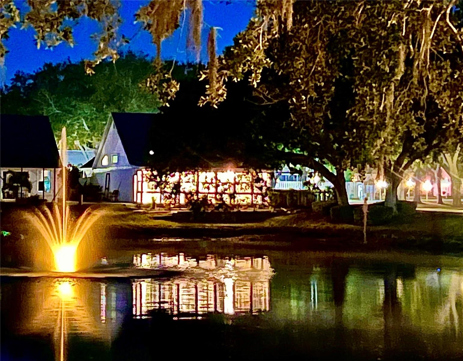 PRICE IMPROVED TO $414,800 — EXCEPTIONAL VALUE!

Yes—you really can have it all. Enjoy low monthly fees of just $188 while taking advantage of community amenities including a pool, tennis courts, and beautifully maintained common areas—all with the added bonus of a Sarasota address with lower Manatee County taxes.

Perfectly positioned just minutes from SRQ Airport and only 15 minutes to downtown Sarasota’s dining, shopping, theaters, and cultural attractions, including The John and Mable Ringling Museum of Art. World-renowned beaches including Siesta Key Beach, Anna Maria Island, Longboat Key, and St. Armands Circle are all within easy reach.

Important ownership note: This is a land condominium, which means you own the single-family home AND the land beneath it, plus an undivided interest in the community’s scenic lakes, preserves, and common areas.

This move-in ready 3-bedroom, 2-bath home offers soaring ceilings, an open floor plan, and tranquil water views in a peaceful natural setting. A sparkling lake with fountain, majestic oak trees, and abundant birdlife—including herons, ducks, and turtles—create a true Florida retreat. Directly across the street, enjoy a lush green sanctuary with seating, plus convenient access to the community pool and tennis courts.

The entire rear of the home opens to a spectacular glass-enclosed Florida Room, fully screened with operable windows and privacy shades—perfect for year-round relaxation or entertaining.

Recent major updates provide peace of mind, including NEW ROOF (2025), fresh exterior paint (2025), hurricane-impact windows, and hurricane-rated garage door.

Additional features include:

Bonus breakfast room with wine refrigerator
Generous storage throughout
Turn-key furnishings available
Move-in ready now, with room to personalize to your taste

Private, peaceful, and centrally located—this is Florida living at an exceptional new price.