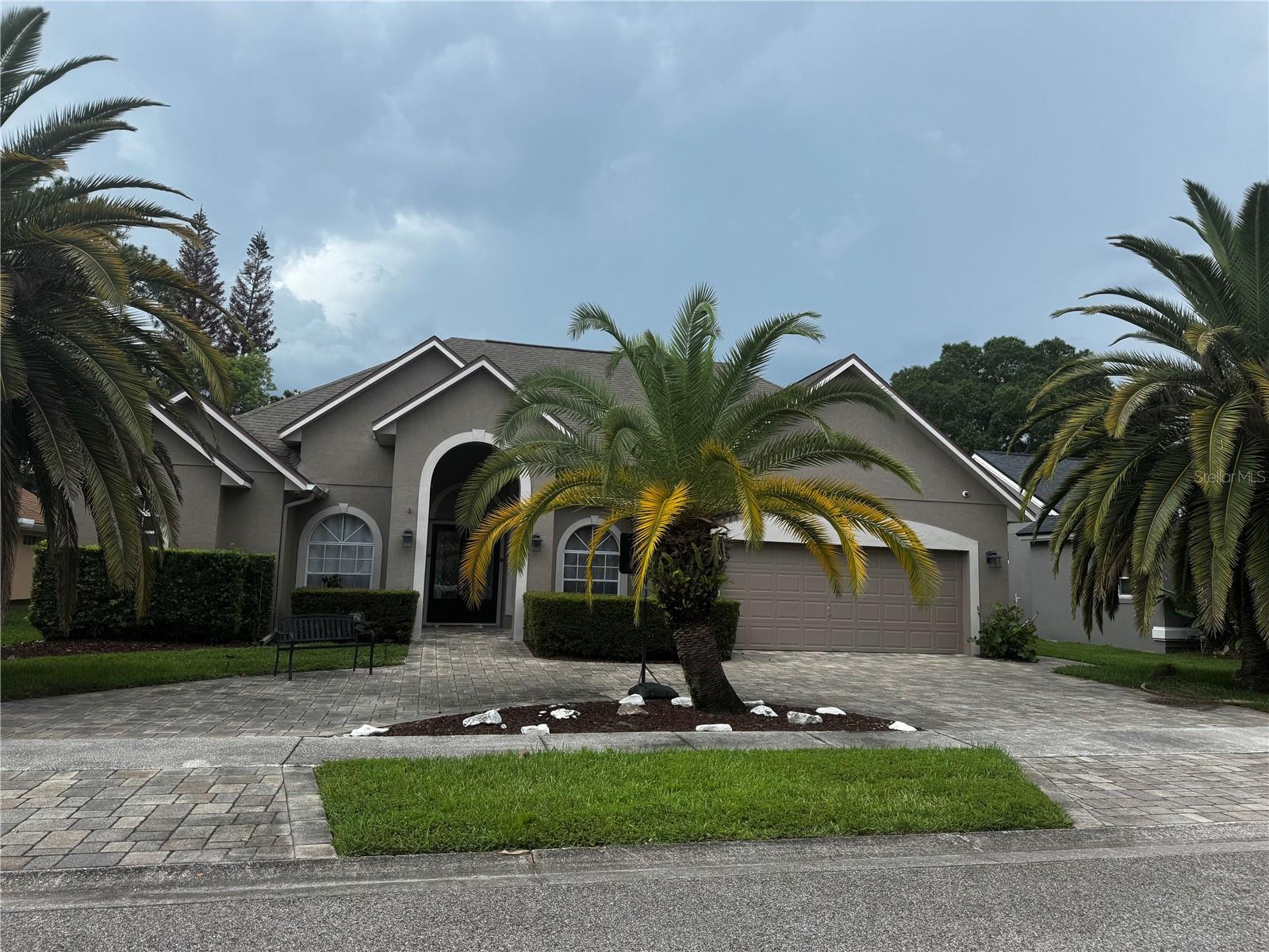 Welcome to your dream home in the desirable Little Creek community of Oviedo! This beautifully maintained 4-bedroom, 3-bathroom home with a private office and oversized bonus room offers the perfect blend of elegance, comfort, and functionality.

Step inside to discover a formal dining room, dedicated home office, and a spacious open-concept layout that seamlessly connects the kitchen, breakfast nook, and family room—ideal for everyday living and entertaining. The screened lanai overlooking a peaceful yard and water feature provides the perfect space to relax and enjoy Florida's beautiful weather.

The thoughtfully designed split floor plan features a luxurious first-floor primary suite complete with two walk-in closets, dual vanities, a soaking tub, separate shower, and private water closet. A guest bedroom and full bath are also conveniently located on the main level. Upstairs, you'll find two additional bedrooms, a full bathroom, and a large bonus room perfect for a media room, playroom, or home gym.

Ideally located just minutes from shopping, dining, top-rated Seminole County schools, UCF, SR 417, Downtown Orlando, Orlando International Airport, and Central Florida's world-famous attractions, this exceptional home offers the lifestyle you've been searching for.

Don't miss the opportunity to make this beautiful Little Creek home yours—schedule your private showing today!