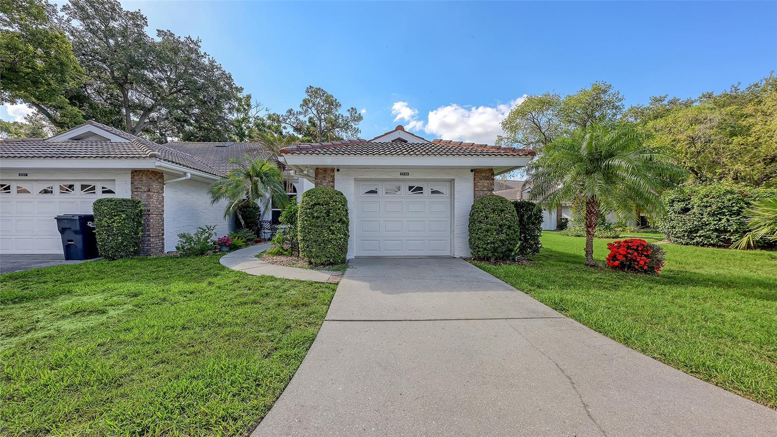 Prepare to enjoy maintenance-free Florida living in one of the area's most desirable active adult communities—Garden Lakes! This gated, move-in-ready villa features 2 bedrooms, 2 bathrooms, and a 1-car garage.
Step through the front entry into the bright and inviting living and dining areas, where a large picture window and a wall of sliding glass doors fill the space with natural light. Just beyond, the Florida room/den offers flexible space for a home office, reading nook, or additional sitting area, all while showcasing relaxing views of the lush tropical landscape and picturesque lake behind the home. Just steps away, a community deck overlooking the water provides the perfect setting to enjoy morning coffee or unwind with evening breezes.
The spacious primary suite includes a separate dressing area and enjoys beautiful views of the lake and meticulously landscaped gardens. The kitchen features solid-surface countertops, a comfortable dinette area, and a convenient pass-through to the main living space, making both everyday living and entertaining effortless.
Lovingly maintained, this villa represents exceptional value compared to similar homes currently available within the community. Residents of Garden Lakes enjoy an amenity-rich lifestyle, complete with a clubhouse, social activities, heated pool, fitness center, shuffleboard, tennis and pickleball courts, and scenic walking paths—all just moments from your door.
Tucked within a peaceful setting yet conveniently located near grocery stores, shopping, medical facilities, Sarasota-Bradenton International Airport, and I-75, this home offers the ideal balance of tranquility and accessibility. If you've been searching for a well-priced villa in Garden Lakes that combines privacy, convenience, and easy access to community amenities, this one deserves a place at the top of your must-see list.