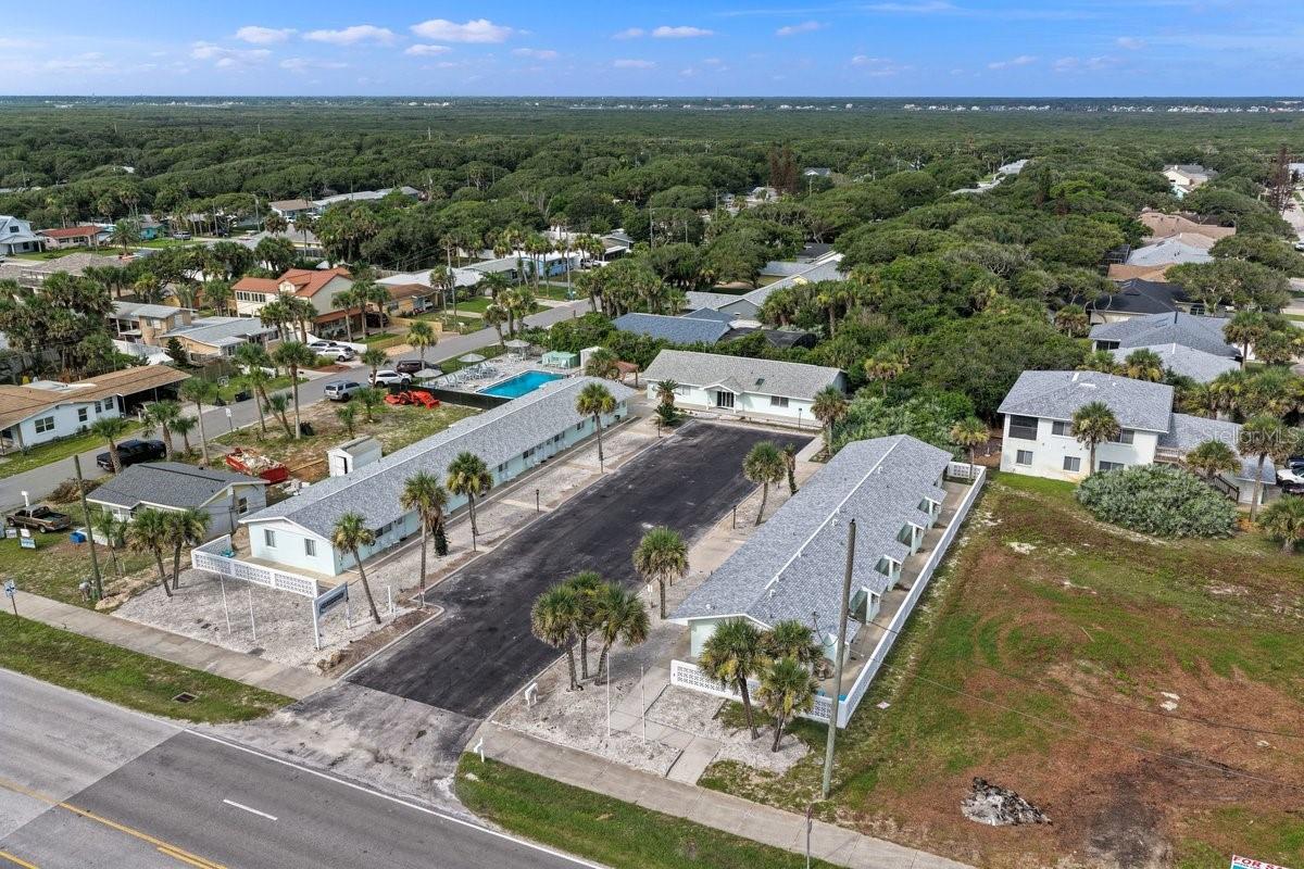 Positioned in one of Florida’s fastest-growing coastal markets, this newly renovated beachside motel presents a rare opportunity to invest ahead of New Smyrna Beach’s next wave of growth. With eleven guest suites, pool, patio, and laundry, this motel is a turnkey investment opportunity. The current owners have done the hard work of renovating, so you have the chance to turn this into an income producing investment.
Over the last five years, New Smyrna Beach has experienced nearly 10% population growth, with continued expansion projected as the transformative Deering Park development moves forward—bringing thousands of new residential units, millions of square feet of commercial and industrial development, and substantial new employment opportunities to the area. 
Already recognized as one of Florida’s premier beach destinations, the New Smyrna Beach Area Visitors Bureau reported over 813,000 visitors in 2025 alone, further reinforcing the area’s strong tourism-driven economy. Average summer weekends bring an estimated 20,000–40,000+ additional visitors to the area, while major holiday weekends can exceed 50,000–80,000+ visitors throughout New Smyrna Beach and surrounding coastal communities. 
As buyers and investors continue seeking alternatives to established luxury coastal markets such as Ponte Vedra Beach, St. Augustine, Amelia Island, Singer Island, Key Biscayne, and Delray Beach, New Smyrna Beach is increasingly positioned for similar long-term appreciation and demand. With limited hotel inventory, expanding infrastructure, strong tourism, incoming jobs, and a rapidly growing market, opportunities to acquire renovated hospitality assets in this location are becoming increasingly limited.
