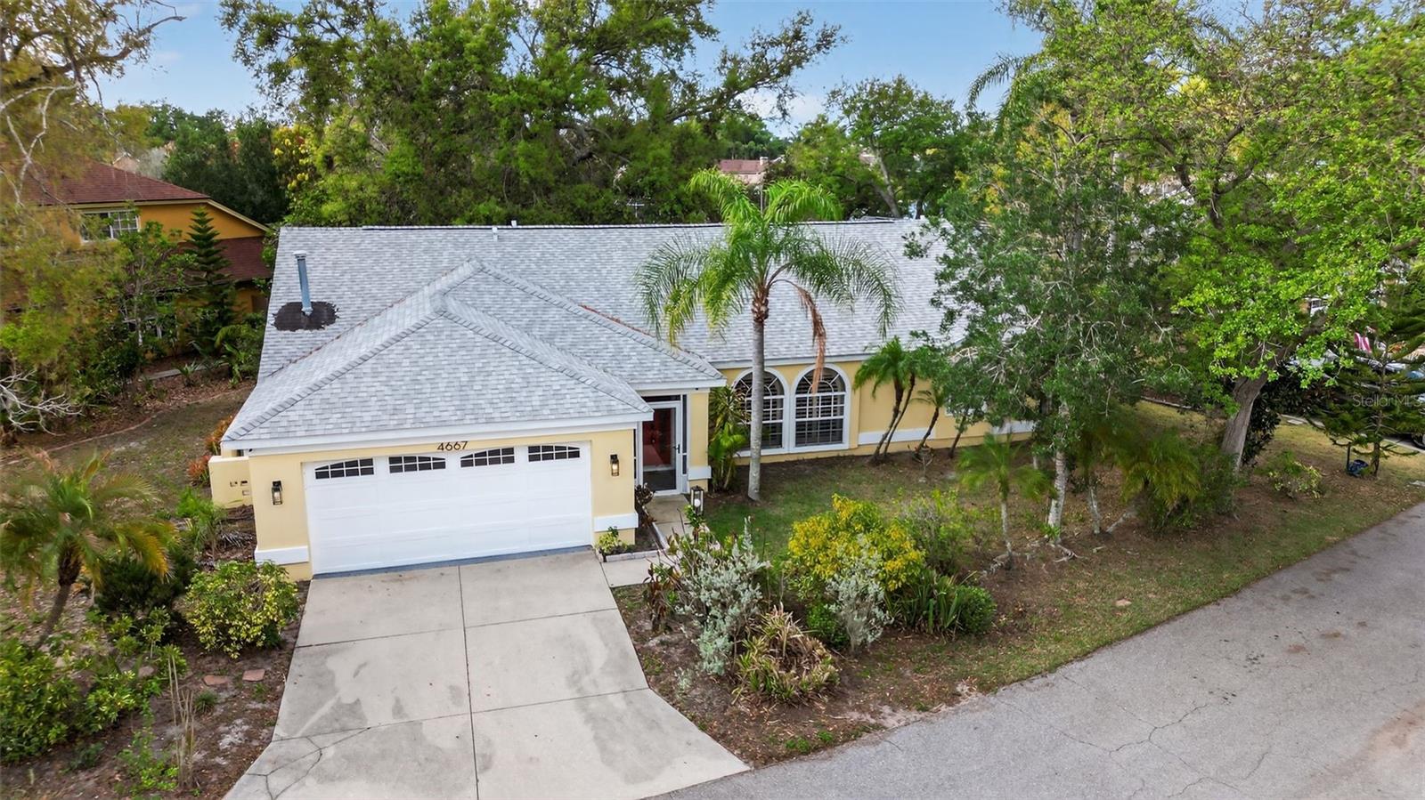 Seller Motivated - Completely Renovated | Prime Sarasota Location. Welcome to the Grove at Beekman Place. Home backs up to the lake.

Fully renovated 3-bedroom, 2-bath home situated on a spacious lot in a desirable Sarasota community. Renovated from top to bottom, this move-in ready property features waterproof luxury vinyl plank flooring throughout and a remodeled kitchen with new custom cabinetry, granite countertops, and recessed lighting. Custom window shades are installed throughout the home. The enclosed Florida room includes new windows, providing additional light and usable living space.

Both bathrooms have been fully updated with modern finishes and fixtures. The split-bedroom floor plan offers functional layout and privacy. The enclosed patio overlooks the landscaped backyard and pond, creating a comfortable space for relaxing or entertaining.

Additional improvements include roof replaced in 2018, 4-ton AC unit installed in 2015, added attic insulation for energy efficiency, and a security camera system.

Conveniently located near Siesta Beach, Downtown Sarasota, marina, University Town Center, Benderson Park, dining, shopping, and entertainment, with easy access to I-75.

Suitable for primary residence, seasonal use, or investment.