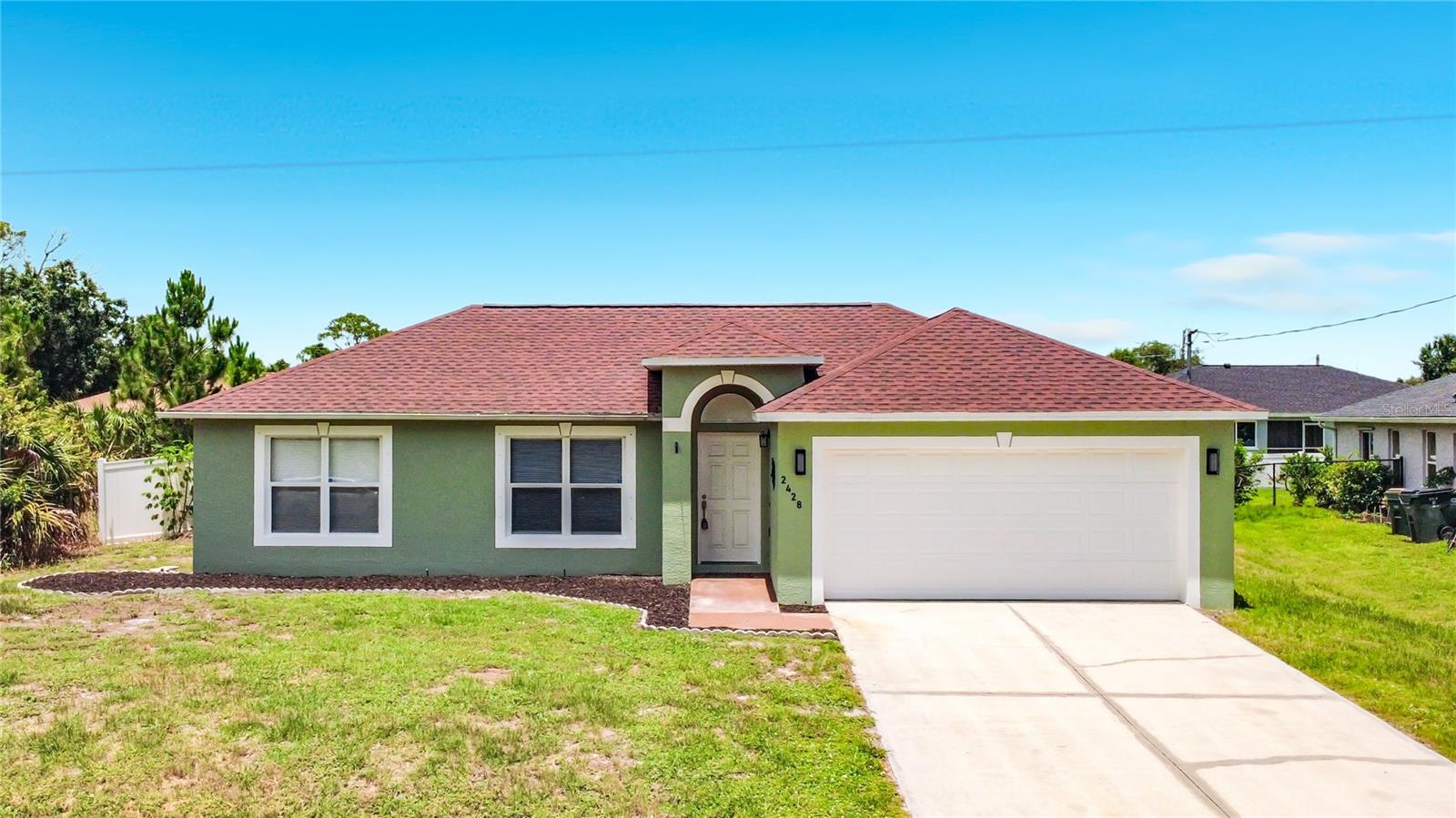 Welcome to 2428 Saginaw Road, a beautifully maintained Florida home located in one of North Port's most desirable and rapidly growing neighborhoods. This spacious 3-bedroom, 2-bath residence offers over 1,500 square feet of comfortable living space designed for both everyday living and entertaining.  You will LOVE the spacious family room while still affording a large livingroom dining room area.  
Step inside to discover a bright, open-concept floor plan featuring generous living and dining areas, abundant natural light, and a functional layout that makes the home feel larger than its square footage. The split-bedroom design provides privacy for the primary suite while offering comfortable accommodations for family members and guests.  The well-appointed kitchen overlooks the main living areas, creating the perfect setting for gatherings and everyday convenience. The expansive primary suite offers a private retreat complete with an en-suite bath and ample closet space. Additional bedrooms provide flexibility for a home office, guest rooms, or growing families.  Situated on a spacious lot, the FENCED backyard offers plenty of room for outdoor entertaining, gardening, pets, or the future addition of a pool. You will enjoy catching some sunshine in the backyard deck area.  NO HOA fees and a location close to shopping, dining, schools, parks, golf courses, and Gulf Coast beaches, this property delivers both value and lifestyle.  NO STORM WORRIES as HURRICANE SHUTTERS ARE INCLUDED. Get on this GREAT OPPORTUNITY quickly! Enjoy the area Beaches. North Port is rich with archaeological history, beautiful natural springs and more than 75 miles of freshwater canals. Choose to play golf at Heron Creek Country Club only minutes away. Convenient to shopping and restaurants. Baseball lovers will find this home is located a short distance from Charlotte Sports Park and a short drive to the Cool Today Spring Training Stadium. Have fun splashing around at the North Port water park! ENJOY the beaches and boating, fishing and golfing, from nature discovery to shelling and collecting fossilized shark teeth and so much more. Visitors will find more of why they came to Florida for relaxation and adventure in an outdoor wonderland. Hurry to schedule your showing today as this slice of paradise won't last!  Conveniently located near I-75, residents enjoy easy access to Sarasota, Venice, Punta Gorda, and Fort Myers, making commuting and recreation effortless. Whether you're a first-time homebuyer, seasonal resident, retiree, or investor, this North Port gem offers an exceptional opportunity to own a piece of Southwest Florida paradise.  Schedule your private showing today and experience all that 2428 Saginaw Road has to offer.  Video and/or audio surveillance with recording capability may be in use on these premises. Conversations should not be considered private.