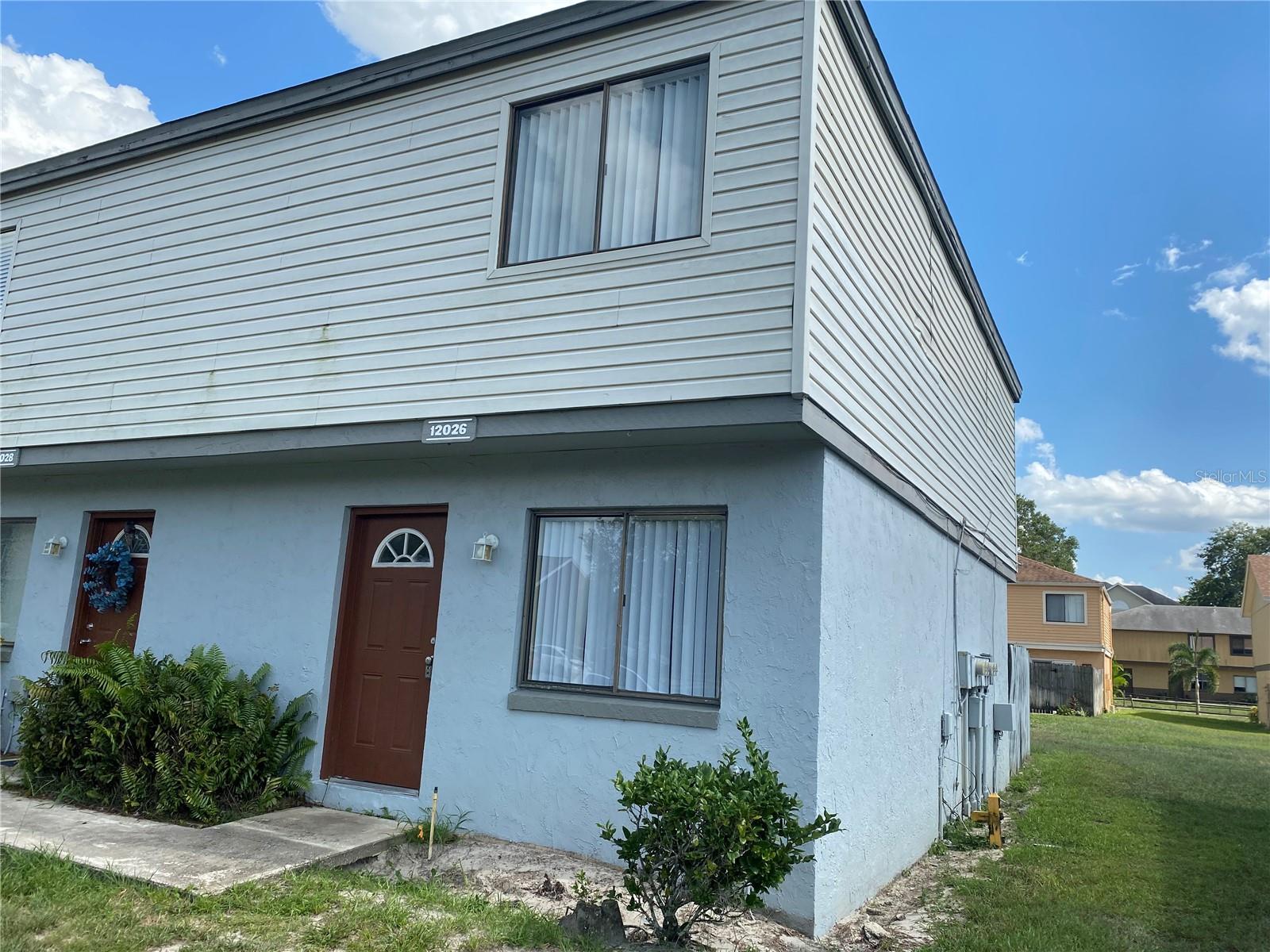 Cute Townhome located in Cambridge Circle a small community just off Alafaya Trail and very close to UCF, Alafaya Trail, Research Park, Orlando International Airport and easy access to SR 408 and E Colonial. The unit has a good-sized family room and the newly renovated kitchen has within it the laundry closet and eating space for small dinette. Guest half bath downstairs. Large under stair storage. Upstairs find 2 bedrooms relatively spacious, each with own vanity and toilet closet, A bathtub shower combo has jack and jill entry from the bedrooms. Sliding doors at kitchen lead to nice fenced in back patio. There is a rear gate that leads out to parking area. Close to bus line, shopping, dining and major state roads and highways, and shuttle to UCF walking distance. Unit is second to the end.