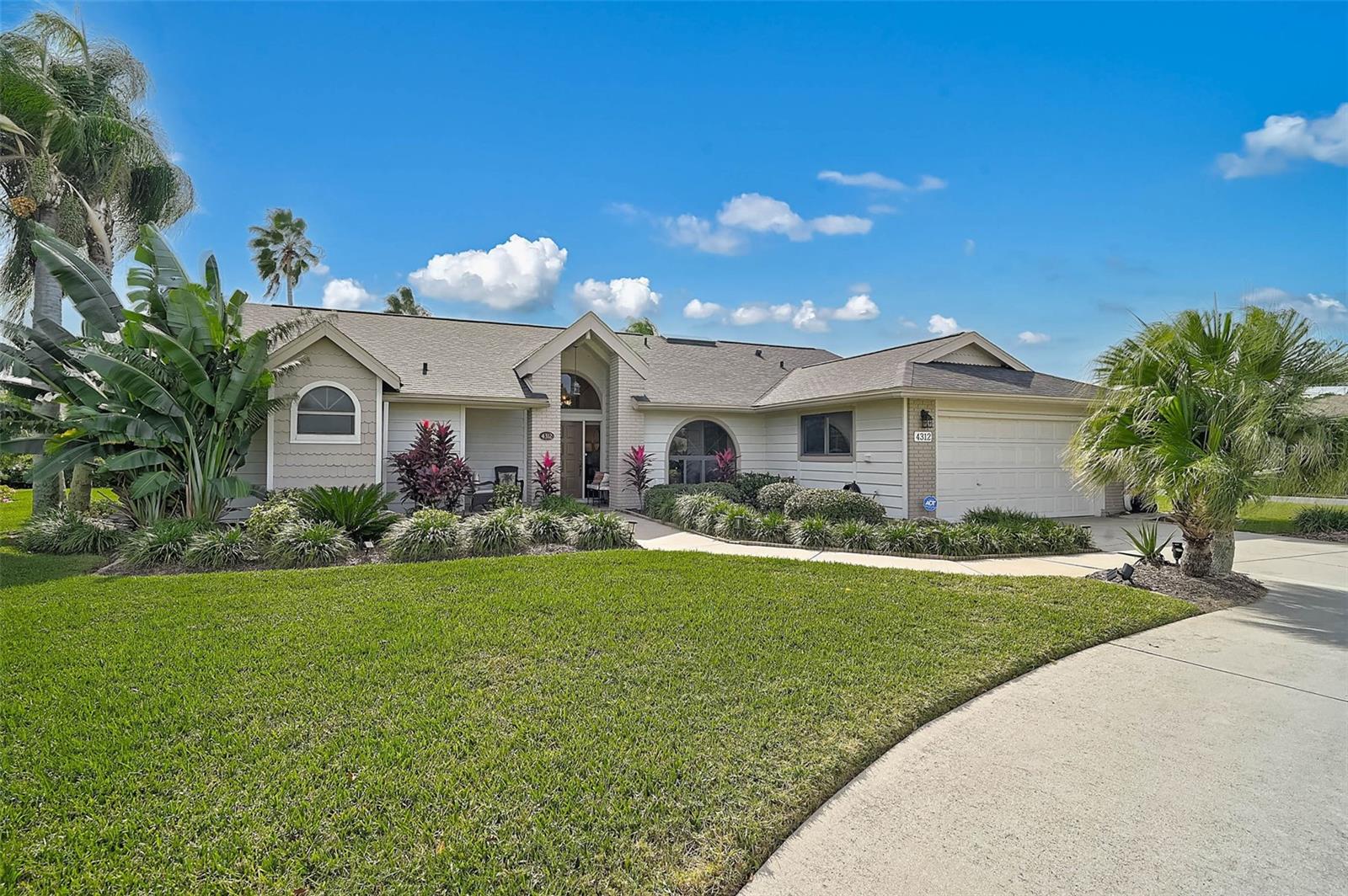 Most furnishings included in this beautifully presented home—enjoy a convenient, move-in-ready opportunity! Gorgeous, Model-Perfect 3BR/2BA plus Den home on a Private Corner Lot! Step into this stunning home offering 2,512 square feet of beautifully designed living space. The entry welcomes you with a striking wood beam ceiling, adding warmth and architectural interest, creating a grand first impression. Situated on a quiet corner lot, the private backyard includes a paver courtyard, organic garden, and plenty of space for a pool—ideal for entertaining or relaxing in style. Inside, engineered wood floors flow throughout, creating warmth and elegance. The primary suite is a serene retreat with dual walk-in closets and a spa-like bathroom featuring dual sinks, a soaking tub, and a separate shower. High ceilings enhance the open, airy feel throughout the home. The enclosed lanai, accessed through three sets of French hurricane doors, features hurricane-protected windows and a new split A/C unit for year-round comfort. The kitchen is bright and inviting with new skylights (2024), a tile backsplash, new dishwasher, and a Culligan reverse osmosis system under the sink. Recent upgrades also include a new roof (2024), new hot water heater, new washer and dryer, and new garbage disposal, making this home completely move-in ready. Additional features include a Hydrawise irrigation that is Wi-Fi accessible, a water softener, and a cozy wood-burning fireplace in the living area. Peridia offers an active lifestyle with an executive 18-hole golf course, tennis, pickleball, heated pool, tiki bar, restaurant & bar, and pro shop. Ideally located, this home is close to shopping, airports, restaurants, and some of the best beaches in Florida, offering both convenience and lifestyle. Additional Fees: $938 quarterly master association fee, $600 annual food/beverage minimum, $100 one-time application fee, $4,000 one-time capital reserve.
