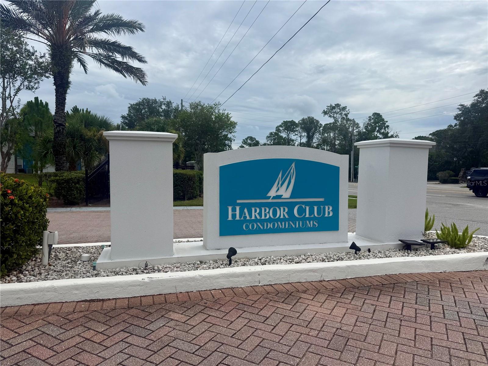 Experience the epitome of luxury living at HARBOR CLUB CONDOS, boasting LOW-MAINTENANCE residences adjacent to the PINELLAS TRAIL. Notably, NO FLOOD INSURANCE IS REQUIRED for this property. This exceptional FIRST FLOOR, CORNER UNIT features 1 bedroom, 1 bathroom, and tile flooring throughout. Sliding glass doors from the living area and second bedroom lead to a spacious patio, ideal for relaxation or entertainment. Additional conveniences include OUTDOOR STORAGE. Recent updates comprise a NEW ELECTRIC PANEL BOX (2024), HOT WATER HEATER (2023), and HVAC (2017). As part of the Harbor Club community, residents enjoy a PET-FRIENDLY lifestyle with access to a COMMUNITY POOL, hot tub, PICKLEBALL and tennis courts, picnic area, and grill. Strategically located just 5 miles from Honeymoon Island State Park, renowned for its pristine beaches, nature trails, and breathtaking Gulf sunsets, and merely 5 miles from Downtown Dunedin and Main Street's charming shops and restaurants. Additionally, residents are within 11 miles of Clearwater Beach and 19 miles of Tampa International Airport, ensuring effortless travel and coastal living. Ideally situated near dining, shopping, GOLF COURSES, LOCAL BEACHES, HIGHLY RATED SCHOOLS, and everything the area has,  this residence embodies the essence of Florida living at its finest.