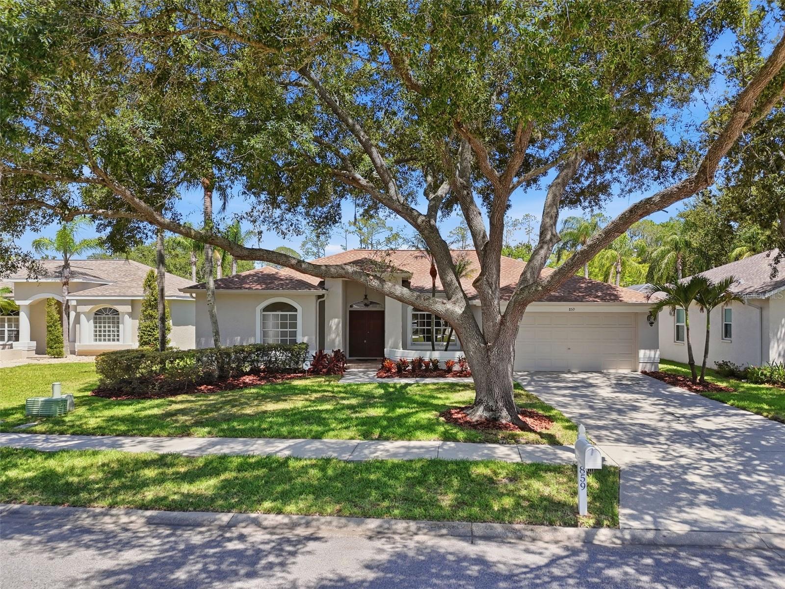 Welcome to 859 Inverry Drive in the highly sought-after East Lake Woodlands community of Oldsmar! Beautifully renovated from top to bottom, this exceptional pool home combines modern updates, timeless style, and Florida living at its finest.

From the moment you arrive, you'll be captivated by the home's exceptional curb appeal, mature landscaping, and inviting presence. Step inside to discover a completely updated interior featuring luxury flooring, a stunning remodeled kitchen, and beautifully renovated bathrooms. Every detail has been thoughtfully designed to create a move-in-ready home that feels both elegant and comfortable.

The spacious floor plan provides an ideal setting for everyday living and entertaining, while large windows fill the home with natural light. The chef-inspired kitchen showcases stylish finishes, updated cabinetry, and modern appliances, making it the heart of the home.

Step outside to your private backyard retreat where a sparkling pool awaits. Surrounded by lush landscaping, the outdoor living space offers the perfect setting for relaxing, hosting guests, or enjoying year-round Florida sunshine.

Located in the desirable East Lake Woodlands community, this exceptional home provides convenient access to shopping, dining, parks, golf, and top-rated schools. With extensive renovations already completed, all that's left to do is move in and enjoy.

Don't miss your opportunity to own this beautifully updated pool home in one of Oldsmar's most desirable neighborhoods!