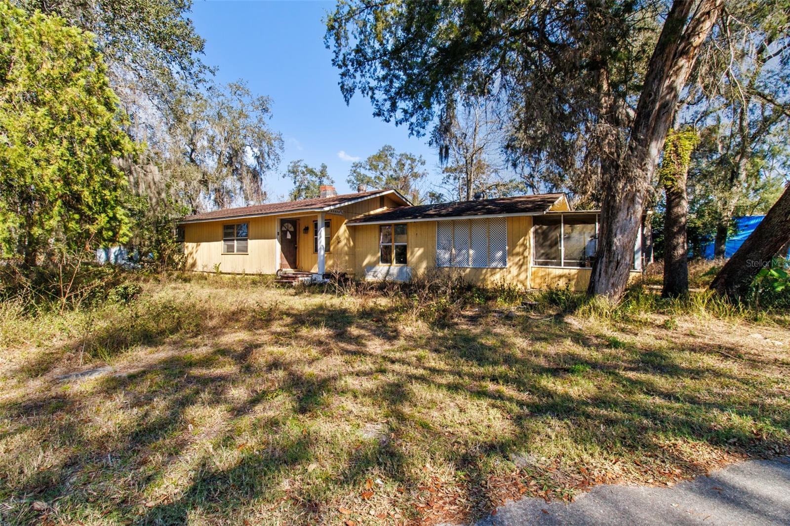 CASH ONLY! Investor alert! This property is all about location and land value. The existing 2/2 structure is best suited for a full rebuild since the repairs must meet current flood regulations, including elevating the home at least 1 foot above base flood elevation. What you’re really buying here is the corner lot, the proximity to the river, and the potential to start fresh.