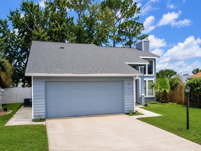 This 3-bedroom 2-bathroom, two-story home is in one of the area's most convenient locations, Port Orange. This home offers 1,312 sq ft with an open floorplan. The cozy family room is spacious and offers a fireplace and natural light from the floor to ceiling windows. The kitchen and bathrooms feature granite countertops. The primary suite located on the main floor and has a private bathroom. The dogs have room to play in the fenced in back yard. There is a community clubhouse and refreshing pool to enjoy on the hot days of summer.  Located just minutes from local colleges, Daytona Beach, dining, shopping, Southwind Soccer Complex and major roadways.