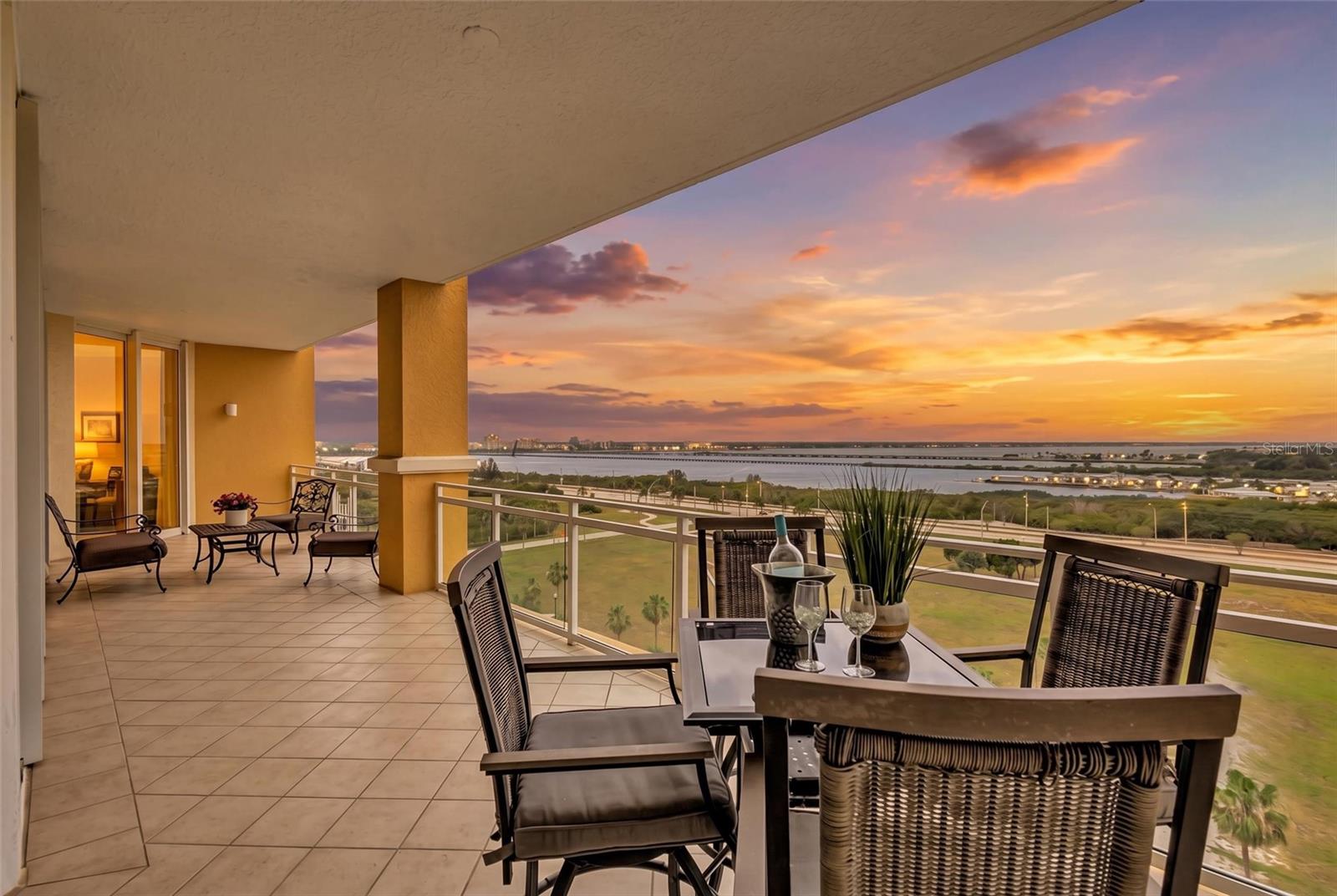 Welcome to LUXURY WATERVIEW LIVING on the 8th floor in the desirable RAPALLO FLOORPLAN at BEL MARE, where nearly 3,000 square feet of thoughtfully designed space is paired with SWEEPING WATER VIEWS. From this elevated residence, take in panoramic scenes of the MANATEE RIVER, ANNA MARIA ISLAND, the iconic SUNSHINE SKYWAY BRIDGE, and out toward the GULF, all setting the stage for unforgettable SUNSET VIEWS. This spacious home offers a SPLIT FLOOR PLAN with three bedrooms, each featuring ENSUITE BATHS, along with a DEN/OFFICE and POWDER ROOM, creating flexibility for guests or remote work. Expansive FLOOR-TO-CEILING IMPACT WINDOWS fill the interior with natural light and showcase HIGH CEILINGS and open-concept living areas that flow seamlessly onto a PRIVATE BALCONY—perfect for enjoying the coastal breeze. The kitchen is both inviting and functional, enhanced by UPDATED LIGHTING that adds a fresh, modern touch throughout the home. Offered FURNISHED (EXCLUDING DECORATIVE STAGING ITEMS), this residence provides a true MOVE-IN READY OPPORTUNITY. The PRIMARY SUITE offers a peaceful escape with water views, DUAL WALK-IN CLOSETS, and a SPA-LIKE BATH featuring a soaking tub and walk-in shower. Residents of this GATED WATERFRONT COMMUNITY enjoy access to RESORT-STYLE AMENITIES including multiple pools, a fitness center, pickleball courts, a theater, social gathering spaces, guest suites, and scenic walking paths, along with access to the RIVIERA DUNES BEACH CLUB. COVERED PARKING and CLIMATE-CONTROLLED STORAGE provide added convenience, while nearby MARINA ACCESS and WATERFRONT DINING enhance the lifestyle. Ideally located near DOWNTOWN BRADENTON, SARASOTA, TAMPA, and the GULF BEACHES, this residence offers the perfect blend of relaxation and accessibility. Added confidence comes with the building’s full compliance with Florida’s STRUCTURAL INTEGRITY RESERVE STUDY (SIRS) requirements—where every day feels like a vacation and every evening ends with a view worth coming home to.