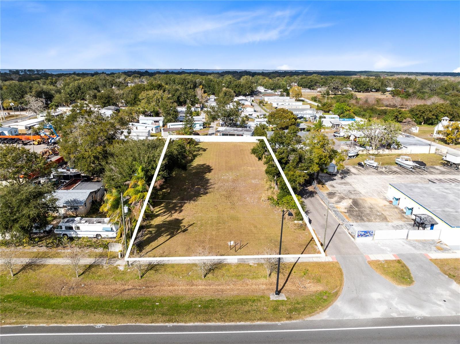 Development-ready .63-acre commercial site with CITY APPROVAL for an 8,200 SF two-story building. Includes DOT approval, SDP approval, and strong frontage exposure with 48,000 AADT. Utilities available within close proximity.  Wide range of approved uses: bakery, restaurant, retail, bank, medical/dental, gym, professional office, veterinary clinic, laundromat, car wash, automobile tire shop, church and much more. Rare opportunity to deliver a fully entitled project in a high-traffic location.