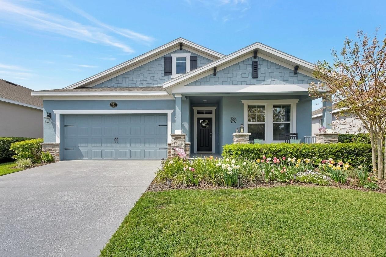 You'll fall in love with this custom 4 bedroom, 3 bath, with a modern farmhouse vibe, located in amenity rich Victoria Trails subdivision. Seller offering $10,000 for buyer's closing cost and Furnishings available separately! The quaint covered porch entry welcomes you to a setting of enjoying your morning coffee, while watching the sunrise. Entering the foyer the board and batten wainscoting line the center hallway to the gathering area which conveniently has the custom remodeled kitchen open to the living and dining areas. The kitchen features shaker style cabinets with built-in organizers, beautiful tile backsplash, large pot size drawers and staggered cabinetry giving you an abundance of storage. The cabinets are soft close and upgraded with sturdy shelving and decorative handles. Stainless appliances have been upgraded with a 5-burner gas range, Instaview French door refrigerator and upgraded dishwasher. Granite countertops give plenty of room for baking and preparing foods. The added custom bar area is perfect for coffee and cocktails and features tile wall with open shelving, dual temperature refrigerator and cabinet with pull-out shelving. Walk-in pantry has solid wood shelving, decorative wallpaper and appliance carports. The abundance of natural light of the wall of windows and sliders keeps the great room area cheerful so you can appreciate the lushly landscaped, partially fenced yard. The living area has wall mount for TV, high hat lighting and ceiling fan. Dining room has a bird's eye view of the lanai and backyard greenery enhanced with solar lighting. Retreat to the primary suite where you can relax and unwind. The bedroom is spacious and features a decorative, coffered tray ceiling, tv mount, barn door entry to en-suite with dual sinks, glass enclosed, tiled shower, soaking tub and privacy lavatory, Open the double doors to the custom closet with built-in drawers, double hanging, shoe storage shelving and custom lighting. A 3-way split bedroom plan ensures privacy for all and one bedroom features a walk-in closet. One hallway has two bedrooms and hall bath with dual sinks and tiled tub-shower combo with linen closet. 4th bedroom is in a separate hallway with bathroom that has glass enclosed tiled shower. The garage has an epoxy finish, two hanging storage shelves, workbench and shelving. There is a 240v plug for charging vehicles and charging station is available separately. The spacious lanai and extended brick paver patio create the setting for outdoor dining and activities. All hard surface flooring for true Florida living with low maintenance. Freshly painted exterior, so many updates thru out, better than new. The amenity center is just a short walk away featuring pool, fitness and playground. This home is under audio-video surveillance and is wired with Smart Home Technology. HOA includes FIBER OPTIC HI-SPEED INTERNET, SPECTRUM TV CHANNELS WITH SELECT PREMIUM APPS, IRRIGATION WATER & USE OF 2-POOLS, 2-FITNESS CENTERS, TENNIS & PICKLEBALL COURTS, PARKS & PLAYGROUNDS. GOLF at VICTORIA HILLS 18-hole course with Sparrow's Restaurant & event room. Located 1 mile to I-4 between Daytona Beach & Orlando, 2 miles to Publix, Aldi, TJ Max & Belks, 5 mi to downtown Deland with boutiques, antiques, restaurants and nightlife, 20 mins to Lake Mary, 25 mins to beaches, 45 mins to Orlando & 1 hour to Disney. Call today for your personalized showing.