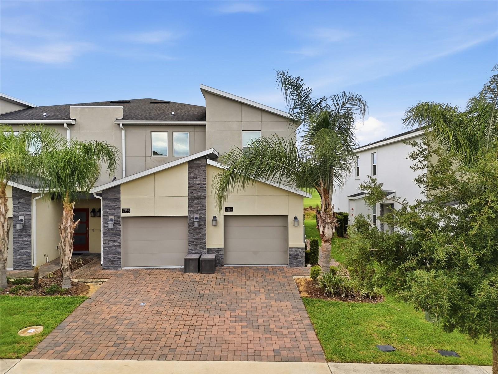 Resort-Style Living Awaits in ChampionsGate! Welcome to this beautifully appointed 2-bedroom, 2-bathroom condo located in the highly sought-after guard-gated golf community of ChampionsGate. Offered fully furnished and move-in ready, this exceptional property is ideal as a primary residence, vacation retreat, or income-producing investment. Inside, you'll find a bright, open-concept floor plan designed for both comfort and entertaining. The stylish kitchen features quartz countertops, stainless steel appliances, abundant cabinetry, and a seamless flow into the spacious living and dining areas. Thoughtfully decorated throughout, the home offers a warm and inviting atmosphere that immediately makes guests feel at home. The spacious primary suite serves as a private retreat, complete with dual vanities, a walk-in shower, and a relaxing soaking tub. A generously sized secondary bedroom and full guest bath provide comfortable accommodations for family and visitors alike. As an owner, you'll enjoy access to the renowned Oasis Club, featuring world-class amenities including a resort-style pool, lazy river, waterslide, splash pad, spa, fitness center, sand volleyball courts, arcade, movie theater, business center, onsite dining, tiki bar, and more. Perfectly situated just minutes from Central Florida's premier theme parks, golf courses, shopping, dining, and major highways, this property offers the ultimate combination of luxury, convenience, and lifestyle. Experience the very best of Central Florida living in ChampionsGate—where every day feels like a vacation.