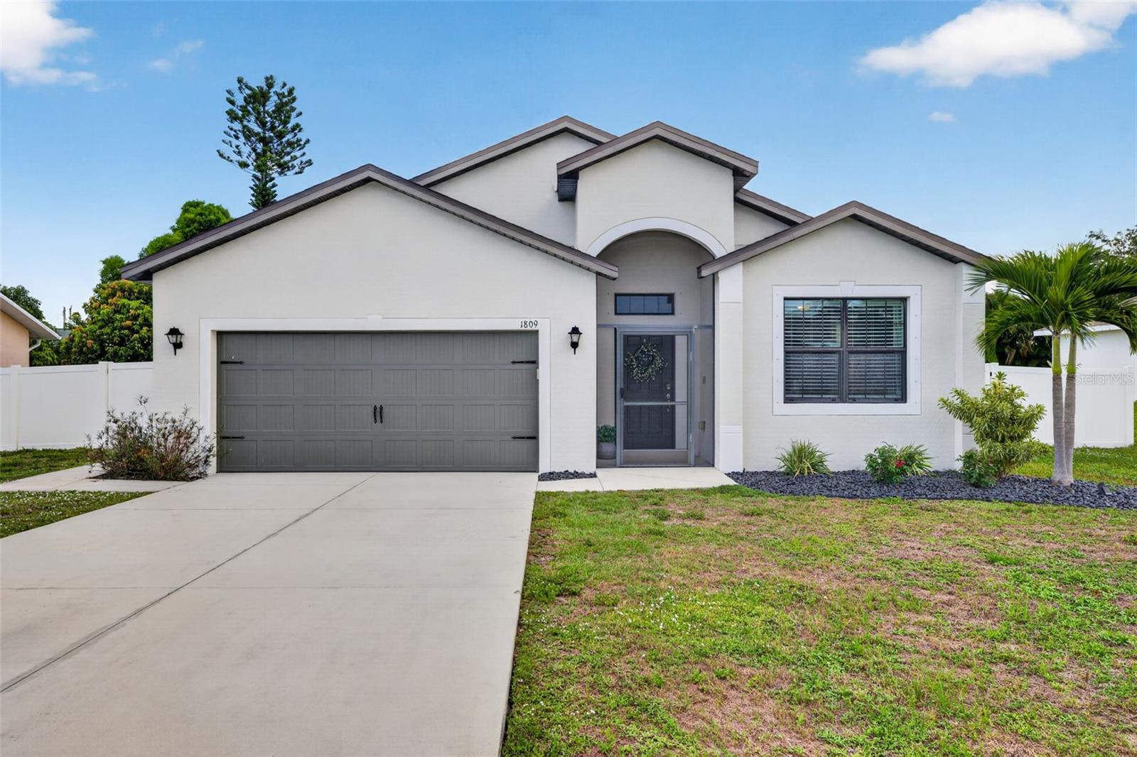 Amazing UPDATED 4 BEDROOM home in great SW Cape Coral neighborhood! Many UPDATES / UPGRADES: NEW Whole House Filtration System, NEW Water Heater 2024; NEW White Privacy Fence; NEW Extended Concrete Patio; 10 x 10 SHED (with Rollup door & Shelving); 
KITCHEN: Bright and sunny kitchen is great for entertaining. Peninsula Island with Breakfast Bar for additional seating and gathering, Pantry,  NEW Quartz tops - 2022, Stainless Kitchen Appliance package including Vent Hood and upgrade Back-splash, stylish Cabinetry updated with NEW finish.  NEW Flooring: Plank Style Luxury Vinyl - 2022. ALLERGY FREE HOME: Never had pets or smokers! ASSESSMENTS Paid in full by Seller at closing! Master  Bedroom Suite: Walk-in Closet, Double Vanity, Walk-In Glass Shower, Oversized Garden Soaking Tub and Private Water Closet. BONUS ROOM: functions as a second Family Room!  LAUNDRY: Washer & Dryer included & Built in Upper Cabinetry. Spacious Under Truss Screened Lanai.  previous flooding at this home. Low cost – ASSUMABLE FLOOD INSURANCE.