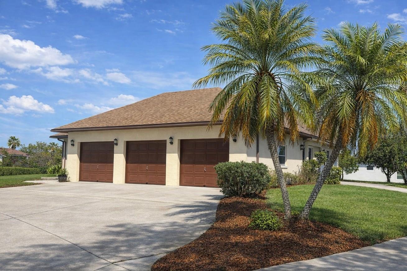 One or more photo(s) has been virtually staged. Discover a truly one-of-a-kind tri-level home in the heart of Poinciana, FL — offering rare architectural character, modern upgrades, and nearly half an acre of privacy with stunning water views. Tucked away on a peaceful flag lot, this spacious residence delivers the perfect blend of comfort, uniqueness, and Florida living.

This home features a newer 2023 roof, a major value-boosting upgrade for long-term peace of mind. The inviting courtyard-style entry sets the tone as you step inside to a beautifully designed layout. The kitchen overlooks a warm and cozy family room complete with a fireplace and sliding glass doors that open to serene pond views — the ideal backdrop for morning coffee or sunset evenings on your second floor balcony.

The thoughtful tri-level split floor plan offers exceptional functionality. The lower half-level includes three bedrooms and a full bathroom, while the upper half-level features two private master suites, each with its own ensuite bathroom. This layout is perfect for multi-generational living, guest privacy, or creating dedicated work-from-home spaces. Throughout the home, you’ll find abundant storage, adding to the everyday convenience.
Car enthusiasts and hobbyists will love the three-bay garage, providing ample room for vehicles, tools, toys, and additional storage.
Outside, the oversized lot offers the kind of privacy and space that’s increasingly hard to find in Poinciana. Whether you envision a garden, play area, or outdoor entertaining space, this property gives you the freedom to create it.

This home is move in ready, giving you the perfect opportunity to add your personal touch and bring your vision to life. With its unique layout, solid structure, and incredible lot, the potential here is unmatched. Located minutes from shopping, dining, parks, schools, and major Central Florida attractions, this home offers both tranquility and accessibility. 

Homes with this combination of land, layout, and opportunity rarely hit the market — move right in and make it your own.