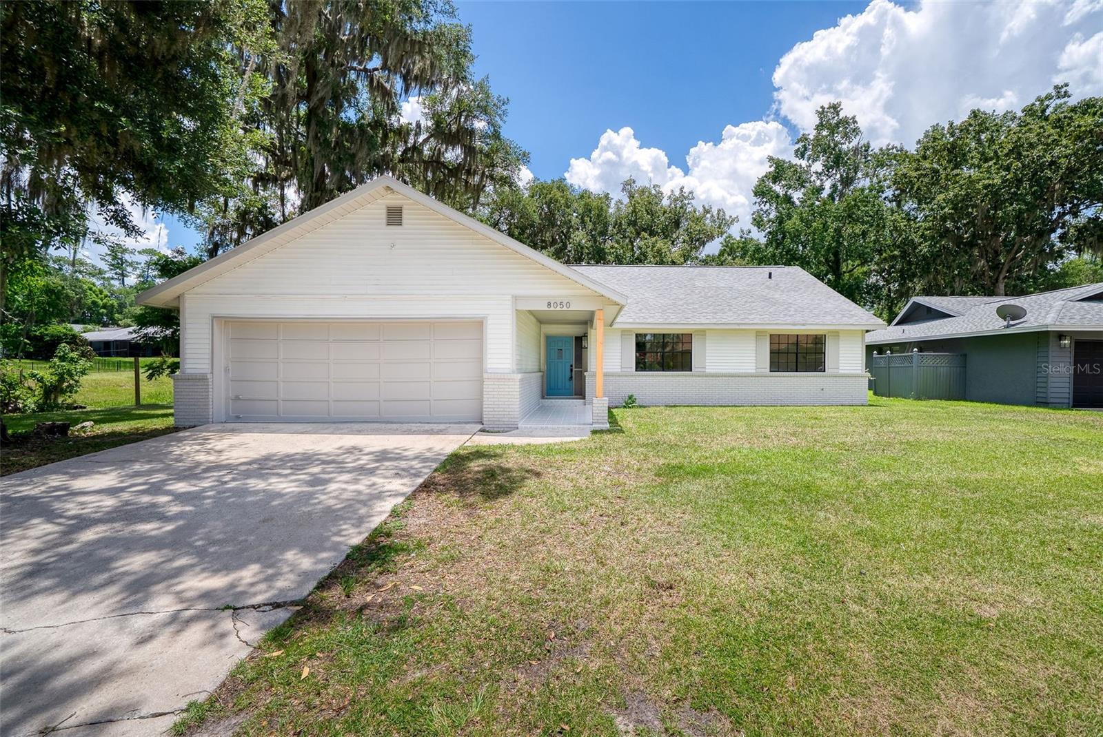 Welcome to this beautifully updated 3-bedroom, 2-bath home in the established Forest Villas community of northwest Ocala. Offering approximately 1,708 square feet of living space, this move-in ready home blends modern updates with comfortable living in a convenient Marion County location.

Step inside to discover a spacious open floor plan featuring a cathedral-beamed great room with a classic brick fireplace, creating a warm and inviting space for gathering with family and friends. The remodeled kitchen offers stylish cabinetry, updated countertops, and newer appliances, while both bathrooms have been tastefully renovated with contemporary finishes. New tile flooring flows throughout the home, providing durability and easy maintenance.