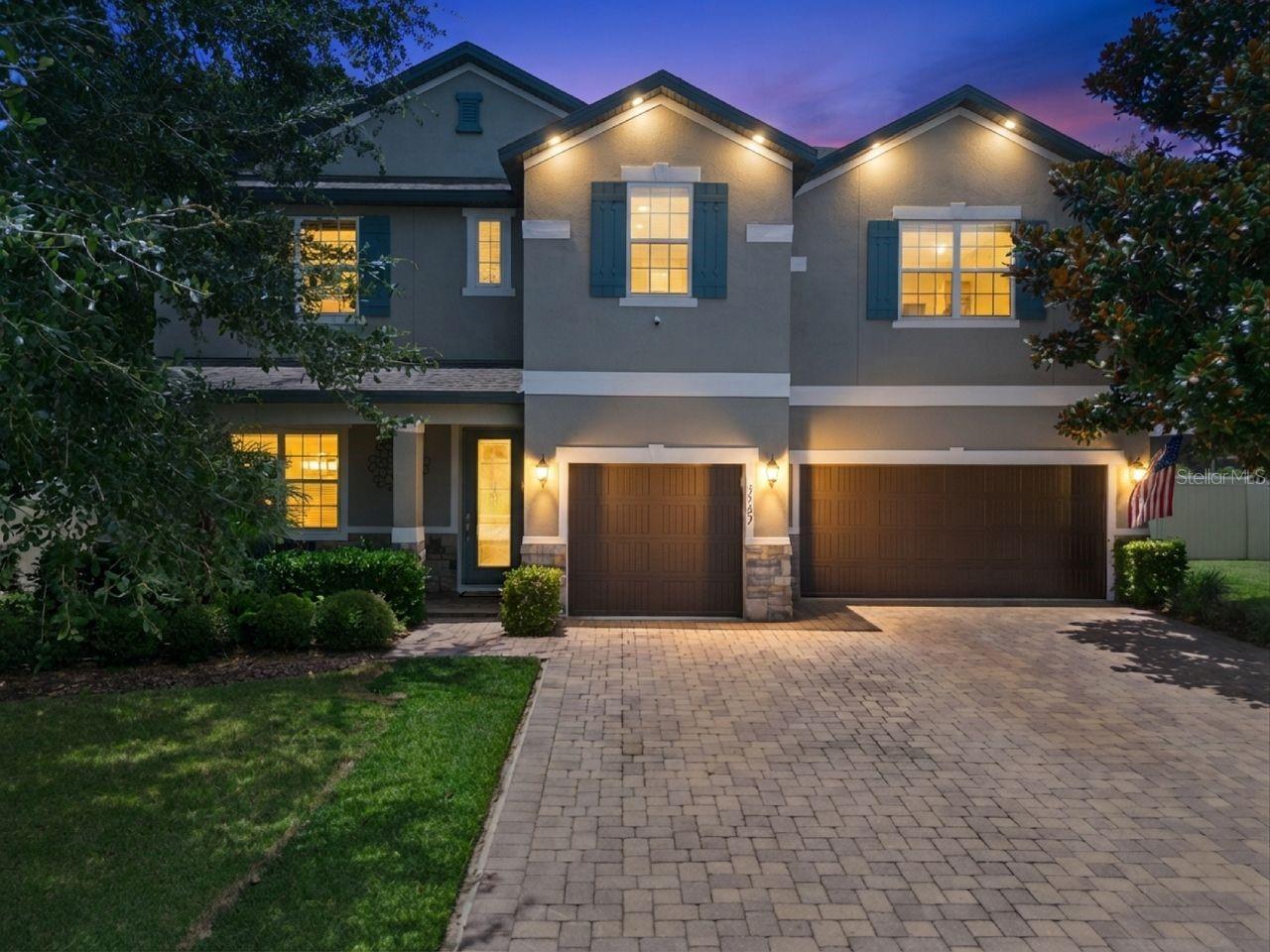 Luxury meets functionality in this stunning 6-bedroom, 4-bath pool home designed for modern living and effortless entertaining. Featuring a sought-after floor plan with a first-floor guest suite and full bath, plus a spacious upstairs loft, luxurious primary suite, and four additional bedrooms, there's room for everyone.

The heart of the home is the gourmet kitchen with premium stainless steel appliances, granite countertops, designer cabinetry, oversized island, stylish backsplash, and abundant storage overlooking the expansive family room. Elegant upgrades include a dramatic open staircase with wrought iron railings and ebony oak treads, custom stacked stone dining room accent wall, wood plank feature wall in the living room, upgraded flooring, lighting, and designer finishes throughout.

French doors open to a large covered lanai, screened swimming pool, and fully fenced backyard, creating the perfect private outdoor retreat for year-round Florida living.

The luxurious primary suite offers a spa-inspired bath with dual vanities, jetted soaking tub, separate glass-enclosed shower, and oversized walk-in closet.

Built with exceptional attention to detail and loaded with premium builder upgrades, this move-in-ready home offers the perfect combination of style, comfort, and quality. Conveniently located near top-rated schools, shopping, dining, parks, and major commuter routes, this exceptional Central Florida home delivers the lifestyle today's buyers are searching for.