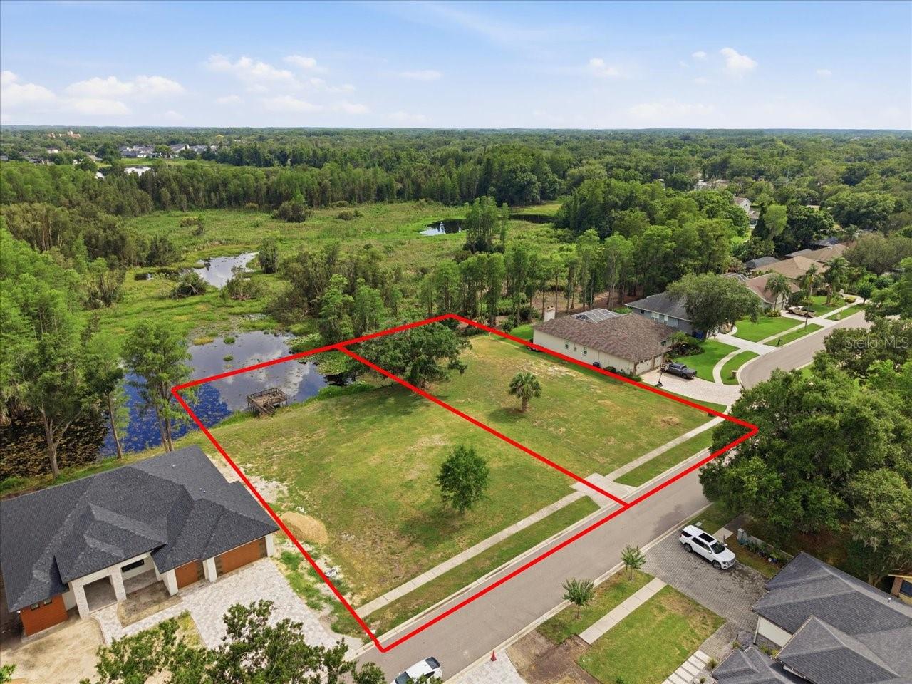 LAKE MAGDALENE WOODS LOT 9 REPLAT - Land
