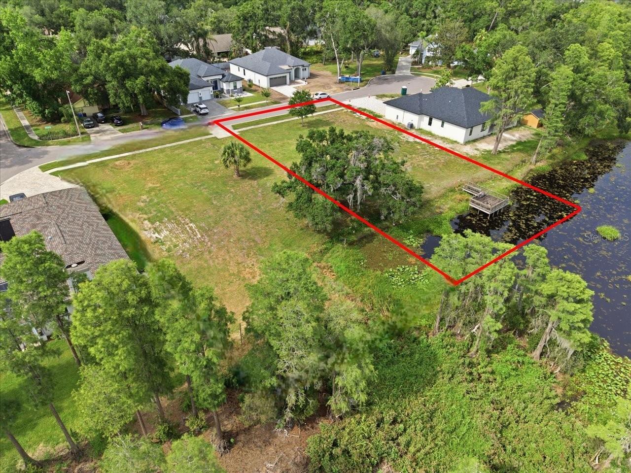 LAKE MAGDALENE WOODS LOT 9 REPLAT - Land