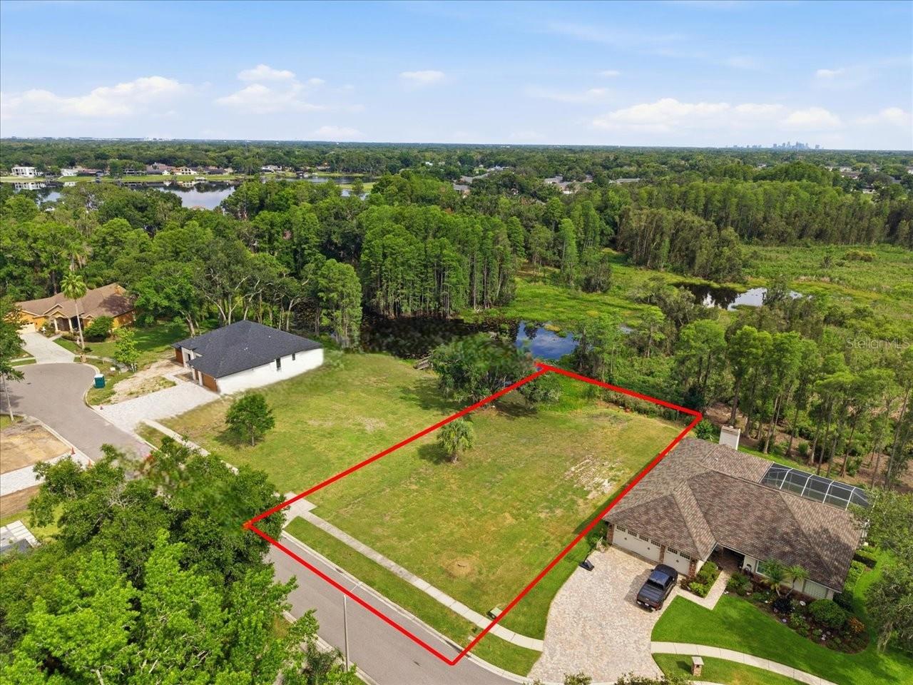 LAKE MAGDALENE WOODS LOT 9 REPLAT - Land