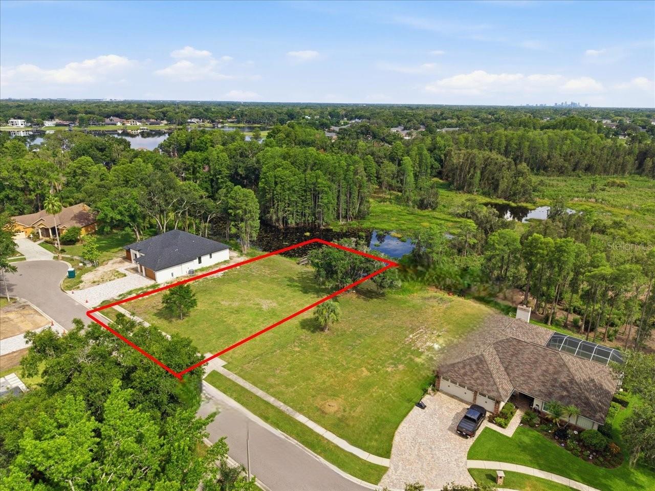 LAKE MAGDALENE WOODS LOT 9 REPLAT - Land