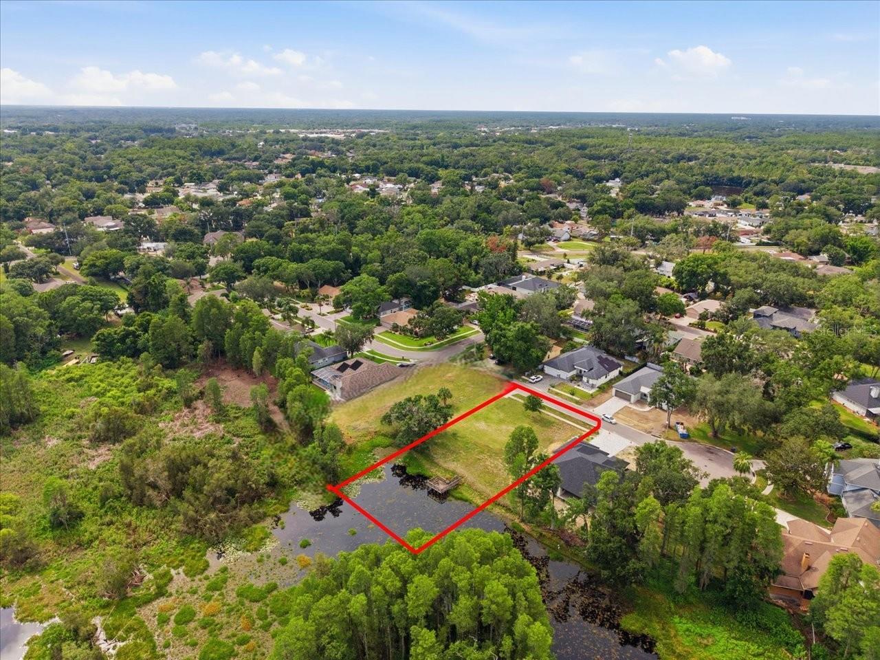 LAKE MAGDALENE WOODS LOT 9 REPLAT - Land