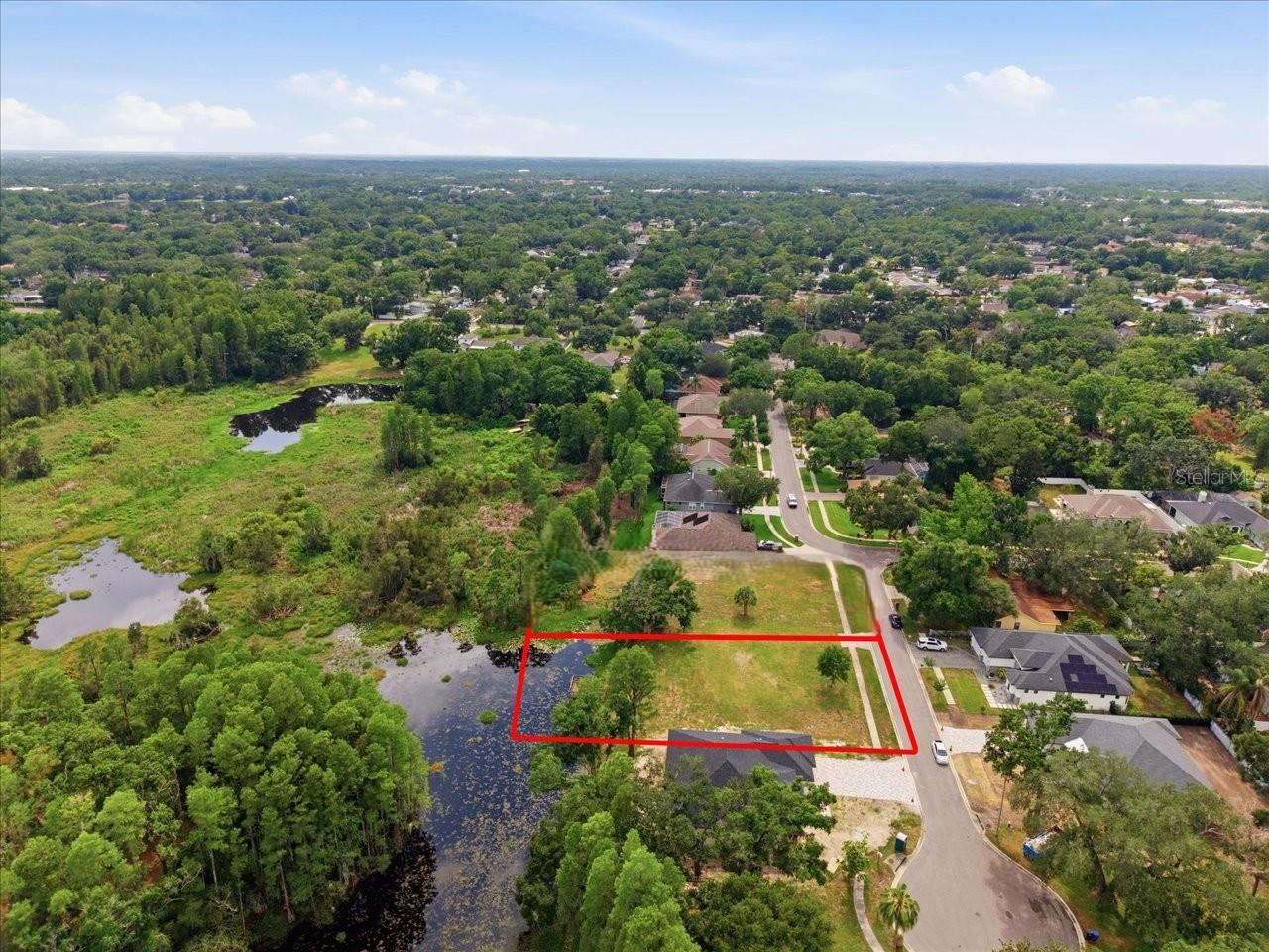LAKE MAGDALENE WOODS LOT 9 REPLAT - Land