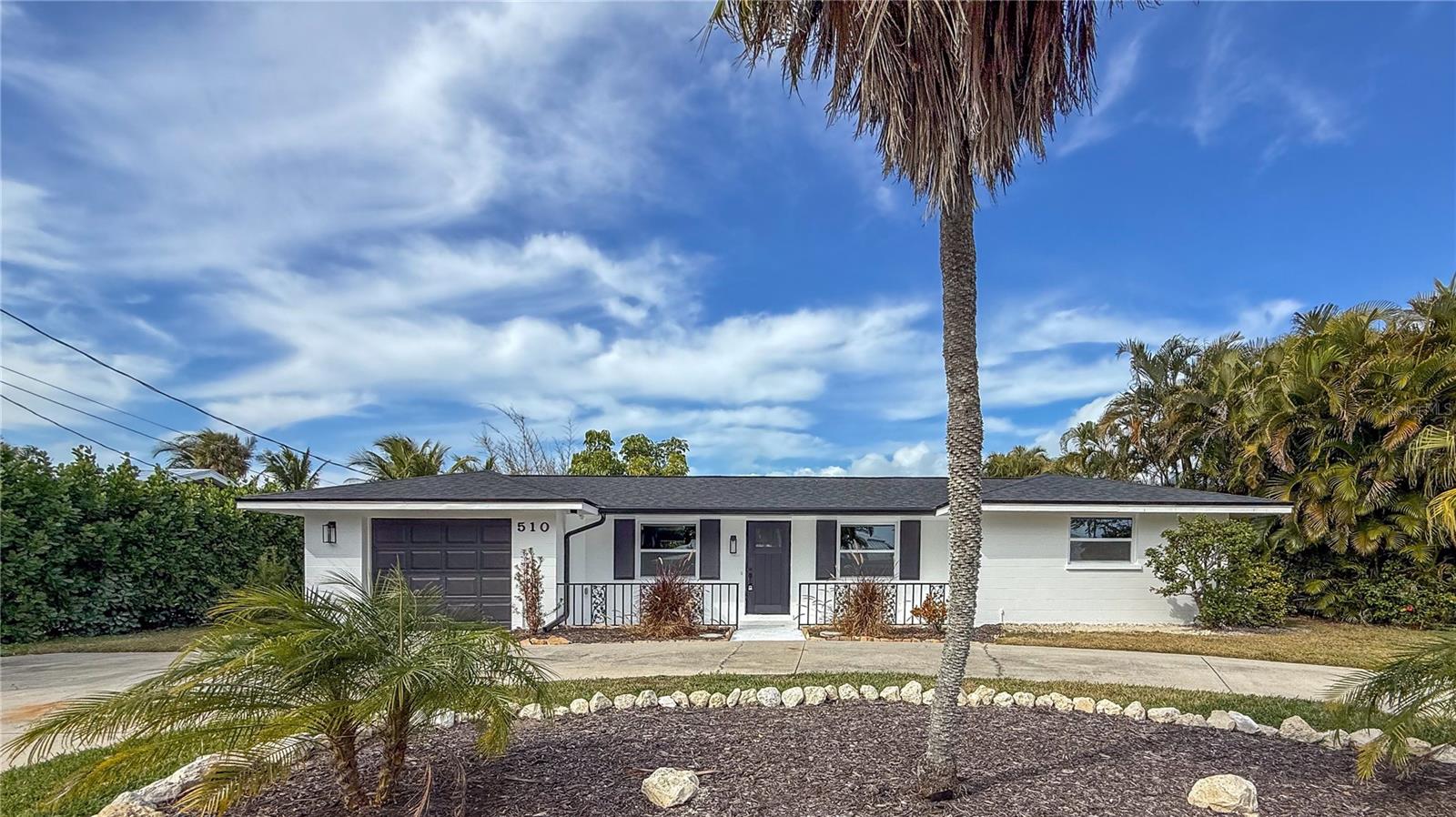 This stunning completely renovated 2-bedroom, 2-bathroom home offers 1,500 square feet of bright, open-concept living space designed for effortless island lifestyle. Step inside to find a seamless flow between the gourmet kitchen, dining area, and spacious living room—perfect for relaxing with friends, family gatherings, or simply soaking in the Florida sunshine that pours through large windows.
The thoughtful renovation shines through with contemporary finishes, high-quality fixtures, and a fresh, inviting palette that feels brand new yet timeless. Both bedrooms provide comfortable retreats, while the well-appointed bathrooms add a touch of luxury.
Situated on a prime lot in desirable Holmes Beach, you'll enjoy generous outdoor space—ideal for morning coffee, evening barbecues, or creating your own tropical oasis. Just moments from the sands of Manatee Public Beach and the calm Gulf waters, this home puts you in the center of Anna Maria Island's relaxed charm: pristine beaches, boutique shops, waterfront dining, and easy access to everything the island offers.
