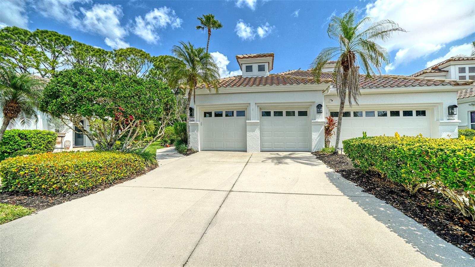 This seldom available single-story home is in the maintenance-free community of Mira Lago of Palmer Ranch. The new buyer has a unique opportunity to have a two-bedroom, two-bath home, with a new barrel tile roof with 15-year warranty installed June 2025 and a new water heater, Hardwood floors and 12-foot ceilings highlight this special home with a huge outdoor living space. Mira Lago is a gated community at northwest corner of Palmer Ranch. The low association fees cover painting the exterior every eight years with a palette of five color choices. The association provides grass cutting and irrigation, mulching, power washing the driveways, sidewalks and the roofs, pest control on the interior and exterior, and Frontier basic cable service of 120 stations with reduced viewing packages. Live just outside of two trailheads to Legacy Trail, near Costco, Gulf Gate, the white sand beaches of Siesta Key and near downtown Sarasota with all the arts and culture, and central to the historical community and downtown, and Venice.