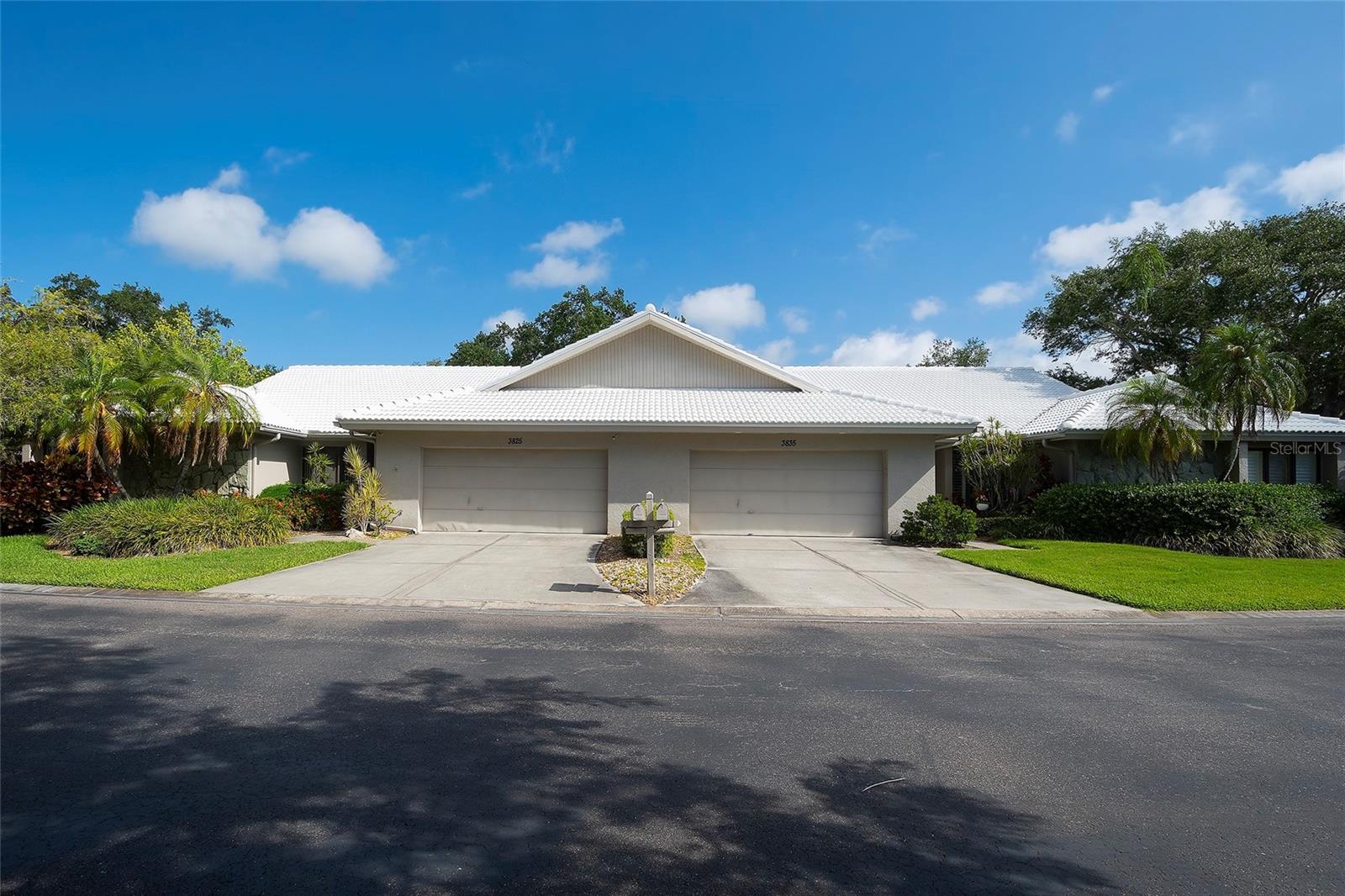 Exceptional value in Sarasota with a NEW TILE ROOF recently installed.  Located in Lakeshore Village South, with over 2,223 square feet of air-conditioned living space, this 3-bedroom, 2-bath, 2-car garage, attached villa, offers an incredible opportunity for buyers seeking space, location, and potential at an affordable price point. Lakeshore Village South is a 55+, PET FRIENDLY section of the community with its own heated pool for community enjoyment. Featuring concrete block construction, a spacious great room floor plan, with vaulted ceilings, galley kitchen, enclosed screened lanai, mature landscaping, and peaceful greenbelt view. The home provides strong fundamentals for future customization and personal design updates. The property has been meticulously maintained and is ready to move in while personal choice upgrades and improvements could be added over time. Quarterly fees include lawn service, cable and internet and exterior maintenance, adding additional value and convenience. Ideal for year-round residents, seasonal owners, or buyers looking to personalize a spacious Sarasota home without paying premium prices for someone else’s renovations. Additional OPTIONAL community opportunity to enjoy amenities: tennis courts,  pickleball courts, an additional heated saltwater pool, horseshoe pits, clubhouse with a kitchen,  library, table tennis, bocce ball, billiard room and countless community events for only $200/yr, see listing agent for details. When location, price and community come together, bring your vision and enjoy the lifestyle of ease, the home offers comfort, space, and privacy in a highly convenient location, close to area restaurants, the beautiful SIESTA KEY BEACH, shopping, airports and so much more. This home is also conveniently positioned near the communities private ( homeowners only)  rear entrance, for easy access in and out  to Beneva RD.