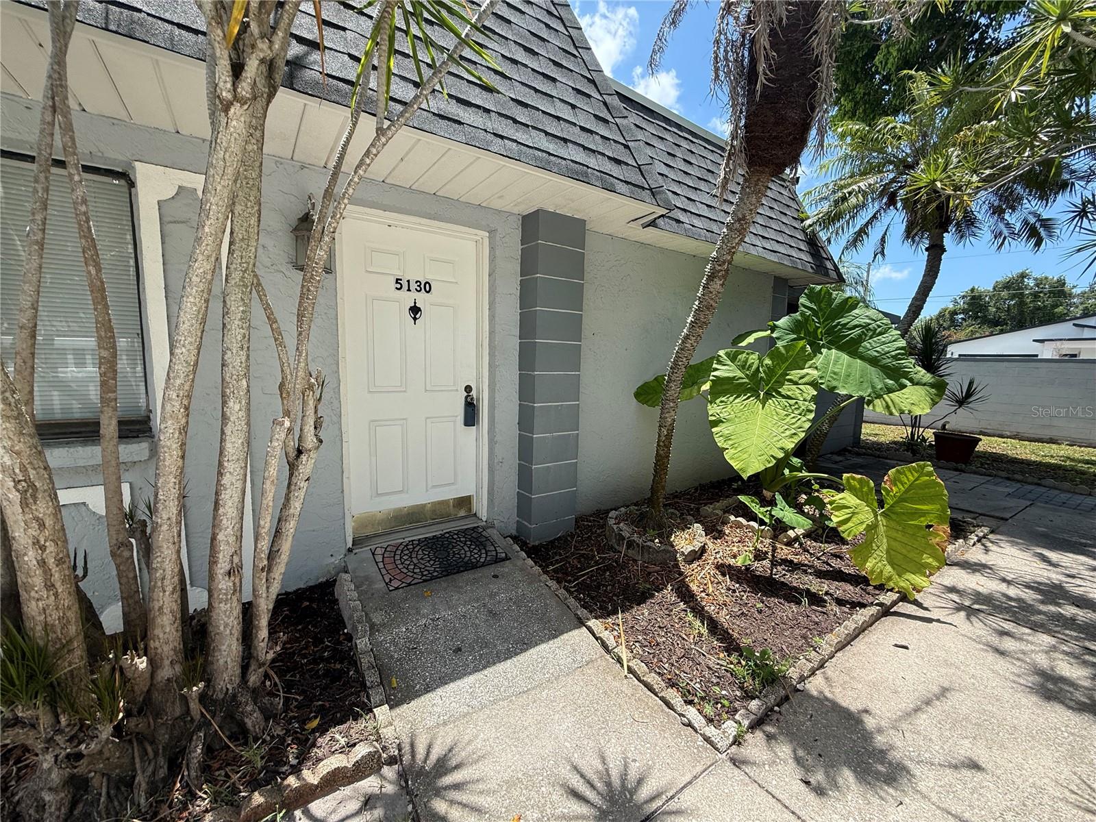 Welcome to this charming 2-bedroom, 2-bath end-unit villa, perfectly positioned on a private corner lot in a quiet and well-maintained community. Featuring tile and wood flooring, abundant natural light, and a spacious Florida room, this home offers comfort and convenience at every turn.
The enclosed Florida room provides valuable additional living space and is the perfect spot to enjoy your morning coffee, unwind with a good book, entertain guests, or simply relax while taking in the peaceful surroundings year-round.
Located just steps from the community pool, this villa includes covered assigned parking, additional storage, and washer/dryer inside the unit. The HOA covers water, sewer, and trash, making for easy, low-maintenance living.
Conveniently situated near shopping, dining, medical facilities, golf courses, parks, and Florida's beautiful Gulf Coast beaches, you'll also enjoy easy access to major roadways for commuting and exploring everything the area has to offer. Whether you're looking for a year-round residence, seasonal retreat, or investment opportunity, this move-in-ready villa is one you won't want to miss!
