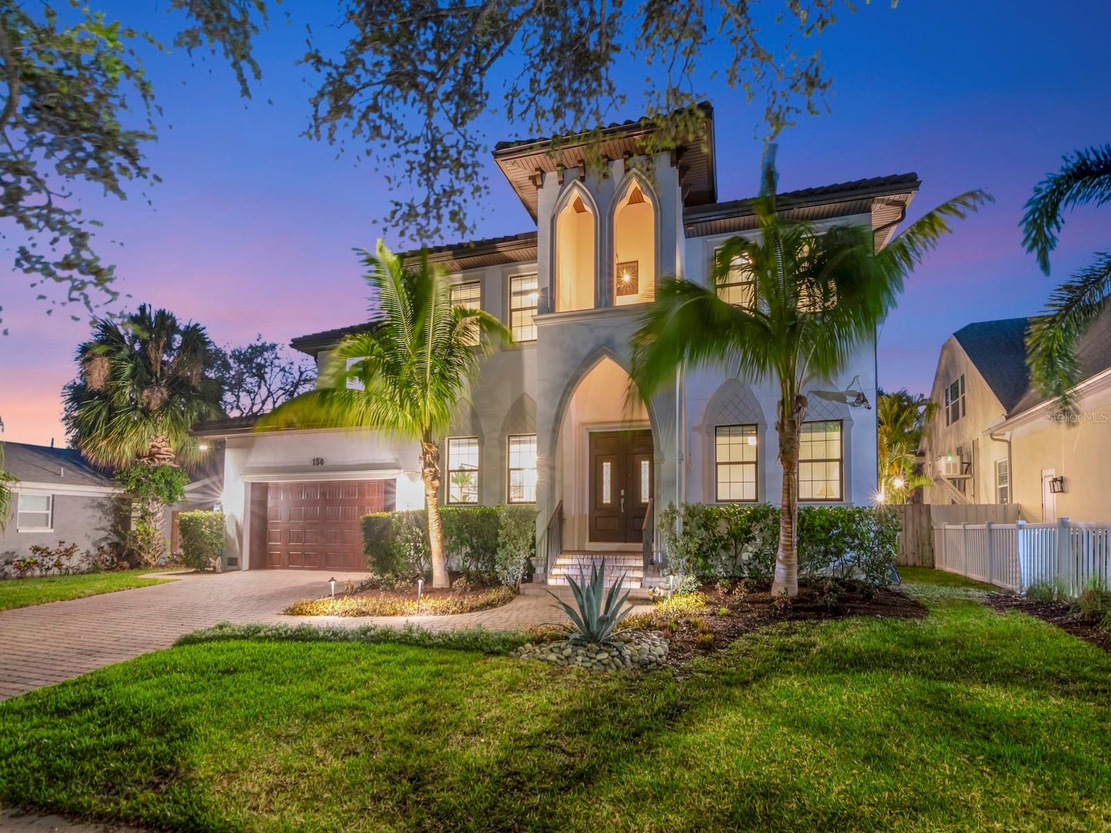 Under contract-accepting backup offers. Introducing a masterfully crafted Davis Islands residence by Devonshire Custom Homes that not only embodies timeless luxury and thoughtful design but also offers peace of mind—having experienced no flooding or water intrusion during the 2024 storms. Spanning five bedrooms, four full baths, and a half bath, with a 2+ car garage, the residence was designed for elevated modern living. A highly sought-after floor plan seamlessly balances refined entertaining spaces with comfortable everyday living. On the main level, a private guest suite with ensuite bath (also serving as a pool bath), a dedicated home office, and formal living or dining space complement the expansive open-concept kitchen and family room. The gourmet kitchen is a statement in both function and style, featuring 42-inch cabinetry with crown detail, soft-close cookware drawers, leathered granite countertops, a large storage island, and a walk-in custom pantry. Premium Viking Range appliances—including double ovens, a drawer microwave, and a five-burner gas cooktop—anchor the space, while a Butler’s pantry with wine refrigeration enhances entertaining. Designer finishes such as custom backsplash, under-cabinet lighting, lazy Susan storage, and pull-out waste drawers reflect meticulous attention to detail. Upstairs, the Owner’s Suite is a true retreat, offering an oversized bedroom, spa-inspired bath with dual vanities, an expansive walk-in shower, deep soaking tub, and two substantial custom walk-in closets. A secondary bedroom functions as a private fitness studio and shares a bath with a bedroom featuring a custom California Closet Murphy bed system with integrated desk and cabinetry. An additional oversized ensuite bedroom serves as a second primary suite—ideal for multigenerational living or long-term guests. All closets throughout the home are custom-designed, and every bath features raised quartz vanities with undermount sinks. The outdoor living experience rivals a private resort. A covered lanai showcases a built-in grill, sink, and prep station, with an extended bar overlooking the heated saltwater pool and spa. Updated pool systems—including a 2022 heater and 2024 pump—are fully app-controlled for convenience. Lush turf surrounds a fire table lounge area, with flexible space for bocce ball or a putting green. The fully fenced grounds and refreshed landscaping create a secluded oasis.  Additional luxury appointments include: Solid 8-foot interior doors, wood flooring throughout the main level, crown molding and abundant natural light, mudroom with custom cubbies and storage, second-floor laundry with full-size sink and cabinetry, remote-operated overhead garage storage, whole-house generator, two new HVAC systems (2025) with transferable 10-year warranty, whole-house water filtration system, tankless gas water heaters, outdoor MosquitoNix system, and Vivint security system with four cameras, including doorbell camera.  Residents of Davis Islands enjoy a charming village atmosphere, a golf-cart-friendly lifestyle, proximity to downtown Tampa, premier dining and shopping, and easy access to Bayshore Boulevard—the iconic 4.5-mile waterfront linear park—as well as Tampa International Airport.  This is a rare opportunity to acquire a resilient, impeccably appointed island residence where luxury, lifestyle, and location converge seamlessly.  The following do not convey: garage fridge, freezer, and free-standing shelving units; washer, dryer, light fixture in living room.