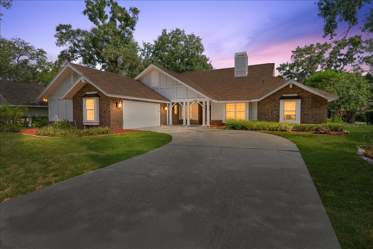 LOCATION. LAYOUT. LIFESTYLE. If you're looking for all of that with an amazing floorplan this Barrington Oaks West gem stands out as an incredible opportunity in one of Palm Harbor's most sought-after communities. With a few of your finishing touches this home is ready to be your own!

Situated on a large lot, this spacious 4-bedroom, 3-bathroom pool home offers over-sized living spaces, a highly desirable split-bedroom floor plan, and the kind of layout today's buyers are searching for. With great bones and endless potential, this home is the perfect opportunity to personalize and create your dream home in a premier Palm Harbor location.

From the moment you arrive, you'll appreciate the impressive curb appeal, oversized driveway, and two-car garage. Inside, you're welcomed with living room, formal dining room, and inviting family room, where a two sided wood-burning fireplace and built-in shelving create a warm and welcoming gathering space.

The heart of the home features a spacious kitchen with a breakfast nook and casual sitting area, offering the ideal setting for entertaining guests or enjoying everyday family life. The thoughtfully designed layout provides both formal and informal living spaces, making it perfect for growing families, multi-generational living, or those who love to host.

The private primary suite  features dual walk-in closets and a spacious en-suite bath with separate vanities, a soaking tub, walk-in shower, and private water closet. The split floorplan allows the primary upmost privacy with the other 3 rooms on the opposite wing of the home. Enjoy a secondary master that serves as the best guest suite with ample space and a full bathroom with a walk in shower. 

Step outside to your own Florida paradise. The screened-in pool enclosure showcases a expansive covered lanai, with vaulted ceilings, a painting, and beautiful wooden BEAMS creating the perfect backdrop for outdoor dining, pool parties, and year-round enjoyment of the Florida lifestyle.

Additional highlights include an indoor laundry room, abundant storage, mature landscaping, and an unbeatable location close to top-rated Palm Harbor schools, parks, shopping, dining, golf courses, beaches, and convenient access to US Highway 19.

If you've been searching for a Palm Harbor pool home with an outstanding layout, generous square footage, and the opportunity to add your own style and value, this is the one you've been waiting for.