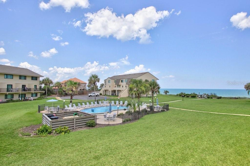 Welcome to Summerhouse, one of St. Augustine’s premier oceanfront resort communities! This beautifully updated 2-bedroom, 2.5-bath townhome offers the perfect blend of coastal charm and modern comfort. The updated kitchen features white cabinetry, granite countertops, and stainless steel appliances, opening seamlessly to the spacious living and dining areas. Step outside to your private balcony and enjoy stunning views of both the pool and the Atlantic Ocean. A convenient half bath completes the first floor. Upstairs, you'll find two generously sized bedrooms and two bathrooms. The primary suite boasts spectacular ocean and pool views, creating a true coastal retreat. Summerhouse offers an incredible array of resort-style amenities, including four heated pools, four private beach walkovers, tennis courts, basketball courts, pickleball and racquetball courts, a playground, RV and boat storage, car wash stations, a fitness center, clubhouse, and gated security. The community also features an on-site short-term rental office, making it an excellent option for personal use, vacation rentals, or investment potential. Don't miss this opportunity to own a piece of paradise with breathtaking ocean views and unmatched amenities!