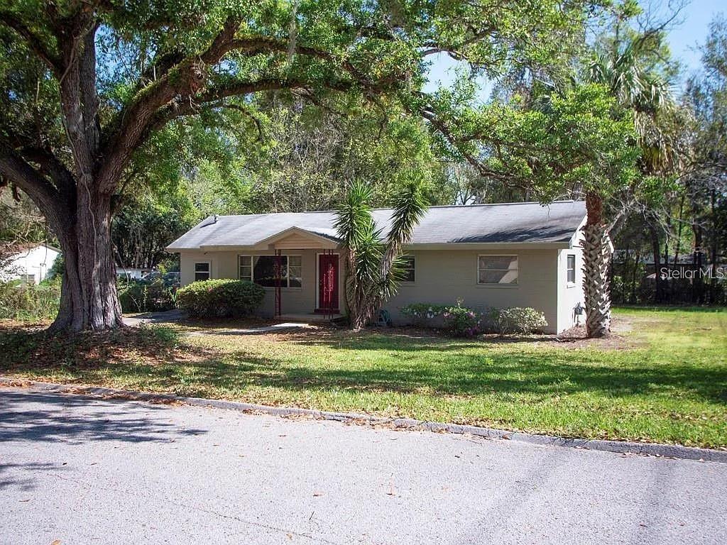 One or more photo(s) has been virtually staged. MORE PICTURES ARE COMING. PICTURES ARE STAGED. HOME IS CURRENTLY FURNISHED AND IS FIXER UPPER. More details coming. 
Located just 5 minutes from Ocala's Historic Downtown Square Ocala Highlands, this charming 3-bedroom, 2-bath home offers endless possibilities for homeowners, investors, or those seeking a renovation project with great upside potential. Situated on a desirable corner lot, the home features multiple living spaces including a formal living room, family room, and dedicated dining area, providing flexibility for a variety of lifestyles.
The kitchen offers a breakfast bar, abundant cabinetry, built-in storage, and plenty of workspace. Original hardwood floors add character throughout the formal living room, hallway, and bedrooms. Several important updates have already been completed, including updated plumbing, a renovated guest bathroom, a new toilet in the primary bathroom, newer gas water heater. 
It needs a new dishwasher and the exterior add ons need some remodeling. Master Shower needs remodeled.
Additional improvements include a roof with added insulation completed in 2008, as well as an A/C system and ductwork that are approximately 3–4 years old. Whether you're looking to create your dream home, add to your investment portfolio, or explore short-term rental possibilities, this property presents an exceptional opportunity in one of Ocala's most convenient locations. Is a possibility this could pass for a conventional loan.