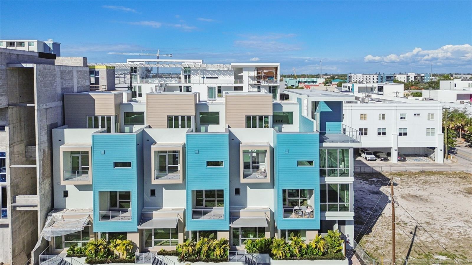 Live ahead of the curve.

Canvas RADD is a modern condominium collection rooted in design, culture, and forward momentum, set inside Sarasota’s Rosemary Arts and Design District. This is where studios replace strip malls, mornings start at Project Coffee, afternoons reset at Shack Yoga, and the city feels alive again. Walkable, urban, and unapologetically modern, Canvas RADD sits at the edge of Downtown Sarasota, exactly where growth and creativity intersect.

The Sky Loft plan is 2,353 square feet, unfolding across three levels accesible by private elevator and a showpiece staircase. Offering 3 bedrooms and 3 baths designed around light, volume, and movement. High ceilings and expansive windows pull the outside in. Balconies layer in air and rhythm. Above it all, a private rooftop terrace and fourth-floor entertaining space becomes your vantage point, built for gatherings, sunsets, late nights, and watching the neighborhood evolve in real time.

The architecture is sharp and intentional. Clean lines. Modern materials. Spaces that feel collected, not conventional. Every home includes an oversized private garage, balancing urban energy with day-to-day ease, whether this is your year-round address, a strategic investment, or a quick creative escape.

Canvas RADD extends beyond private living. Residents have access to shared spaces designed for how you actually live now, including a fitness studio for daily resets and a conference room for focused work, creative sessions, or off-site energy without ever leaving the block.

From here, Sarasota opens up fast. Walk to the Sarasota Farmers Market on weekends. Explore dining and shopping throughout the Rosemary District. Catch a performance at Van Wezel Performing Arts Hall, experience concerts with the Sarasota Orchestra, enjoy evenings out at St. Armands Circle, and spend beach days just minutes away at Lido Beach.